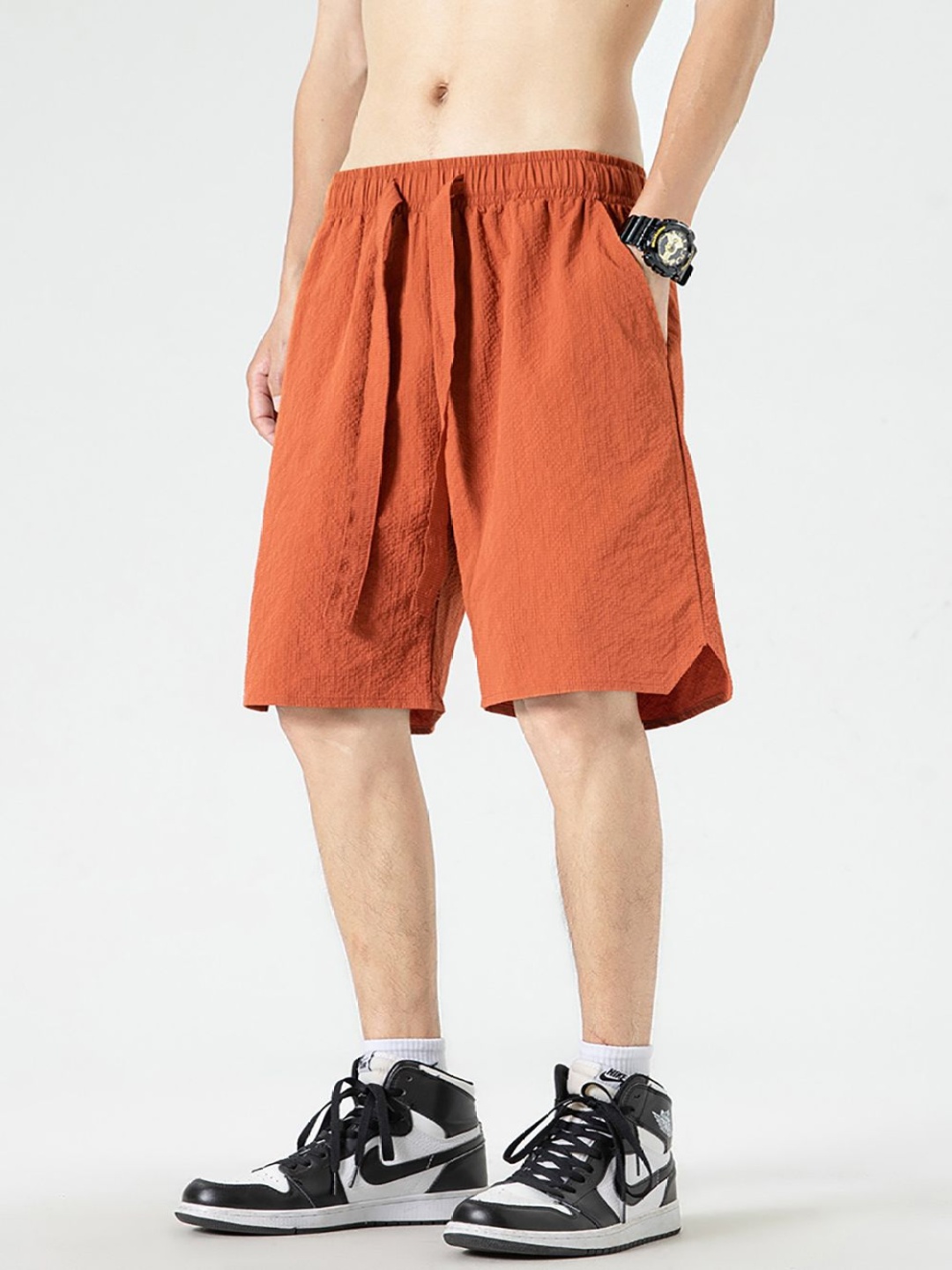 

StyleCast x Revolte Men Loose Fit Shorts, Orange