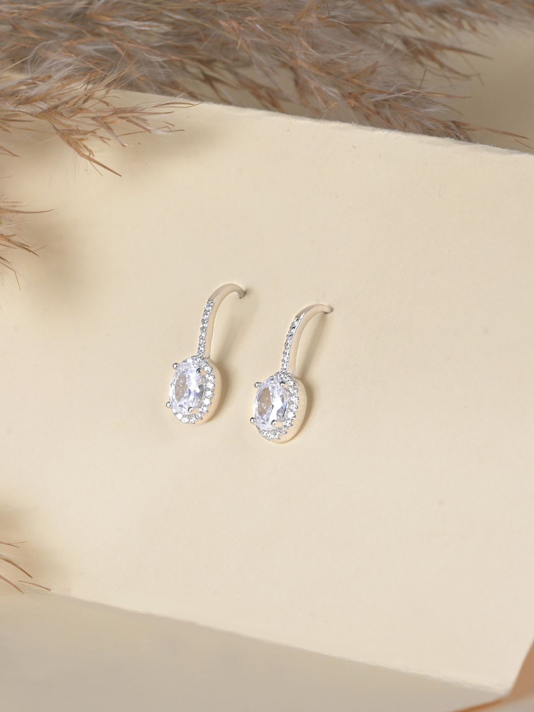

TOUCH925 925 Silver-Plated Cubic Zirconia Studded Oval Shaped Drop Earrings