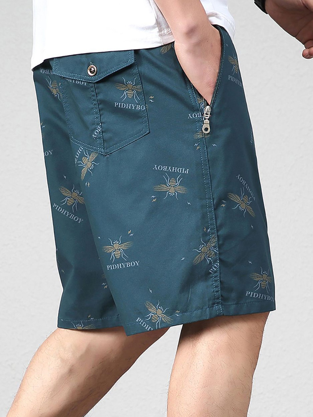 

StyleCast x Revolte Men Printed Shorts, Green