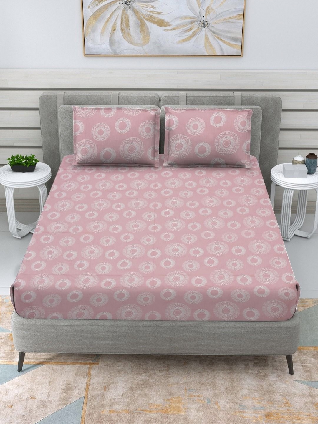 

Myntra Elegant Homes Pink Geometric 160 TC Cotton King Bedsheet Set 2.74 m x 2.74 m