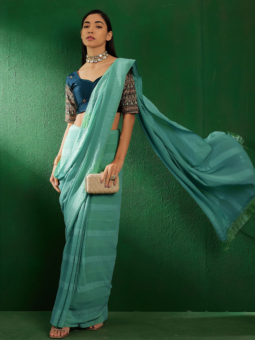 

DEVATITHI Striped Teal Vichitra Silk Saree