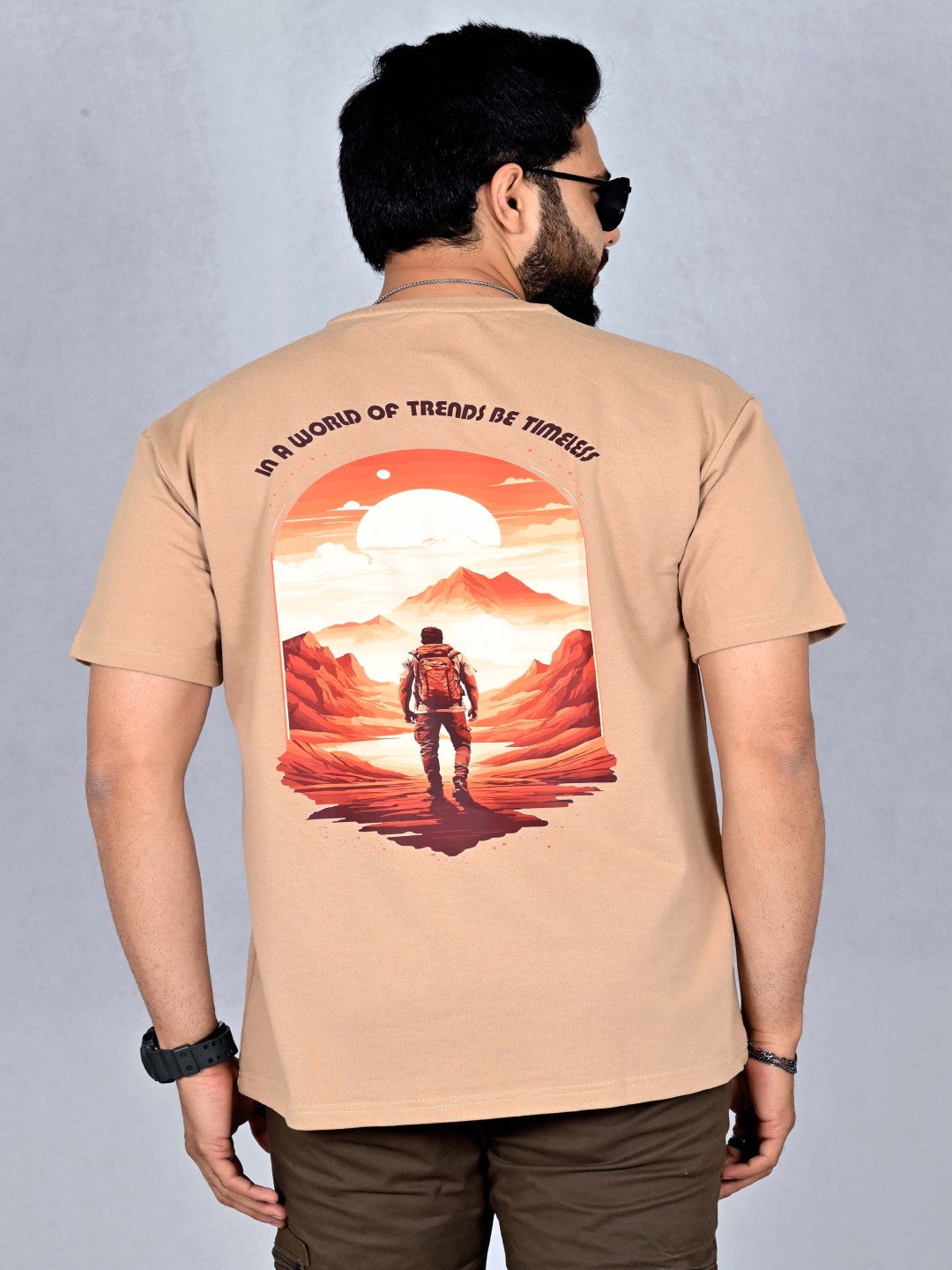 

THE NOMHERD Men Graphic Printed Round Neck Cotton Oversized T-shirt, Beige