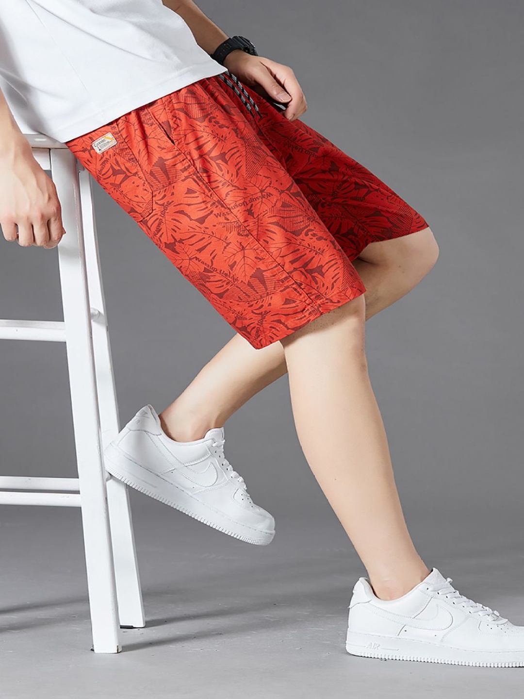 

StyleCast x Revolte Men Conversational Printed Shorts, Red