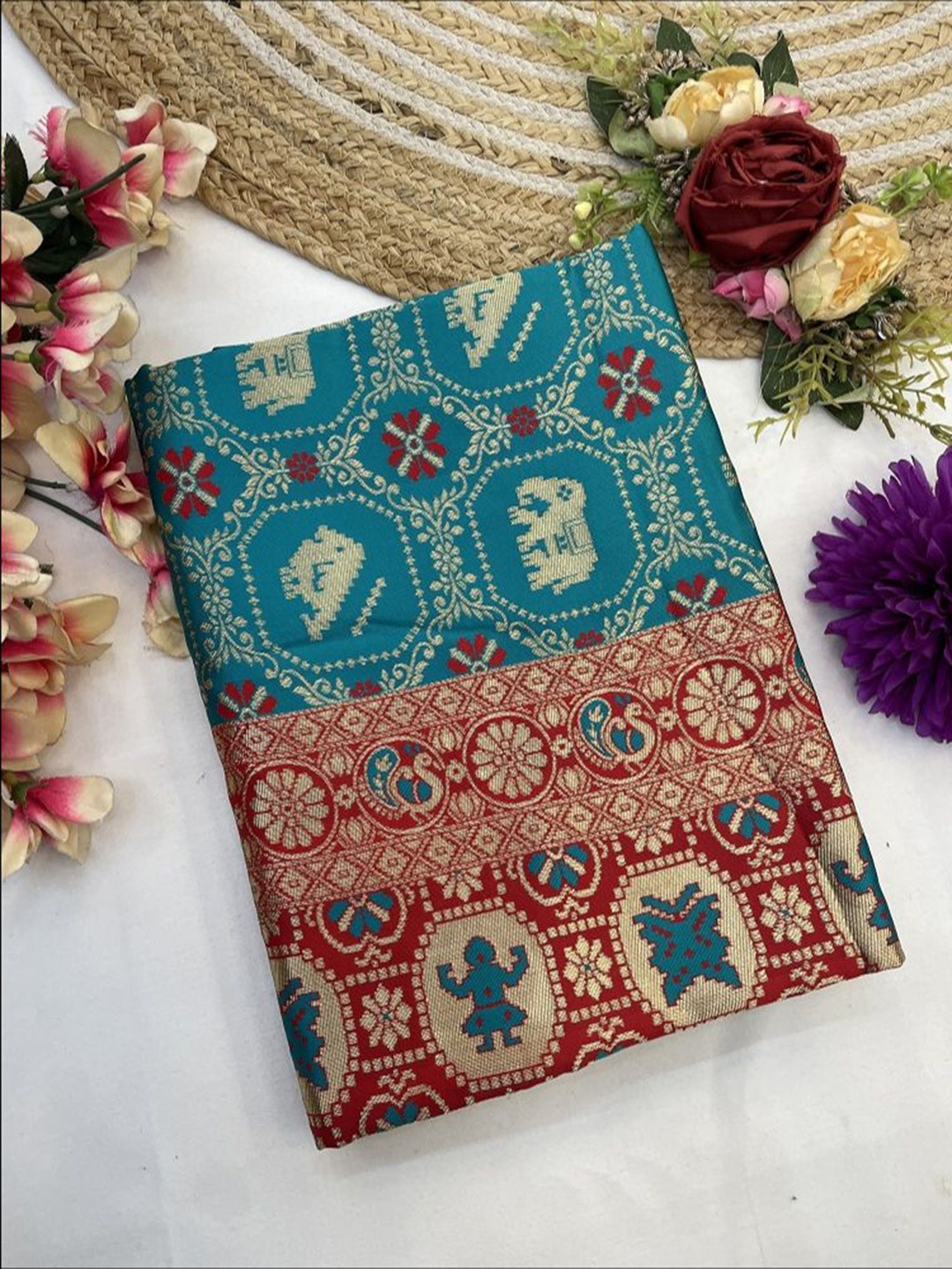 

S.K.C Ethnic Motifs Woven Design Zari Banarasi Saree, Turquoise blue