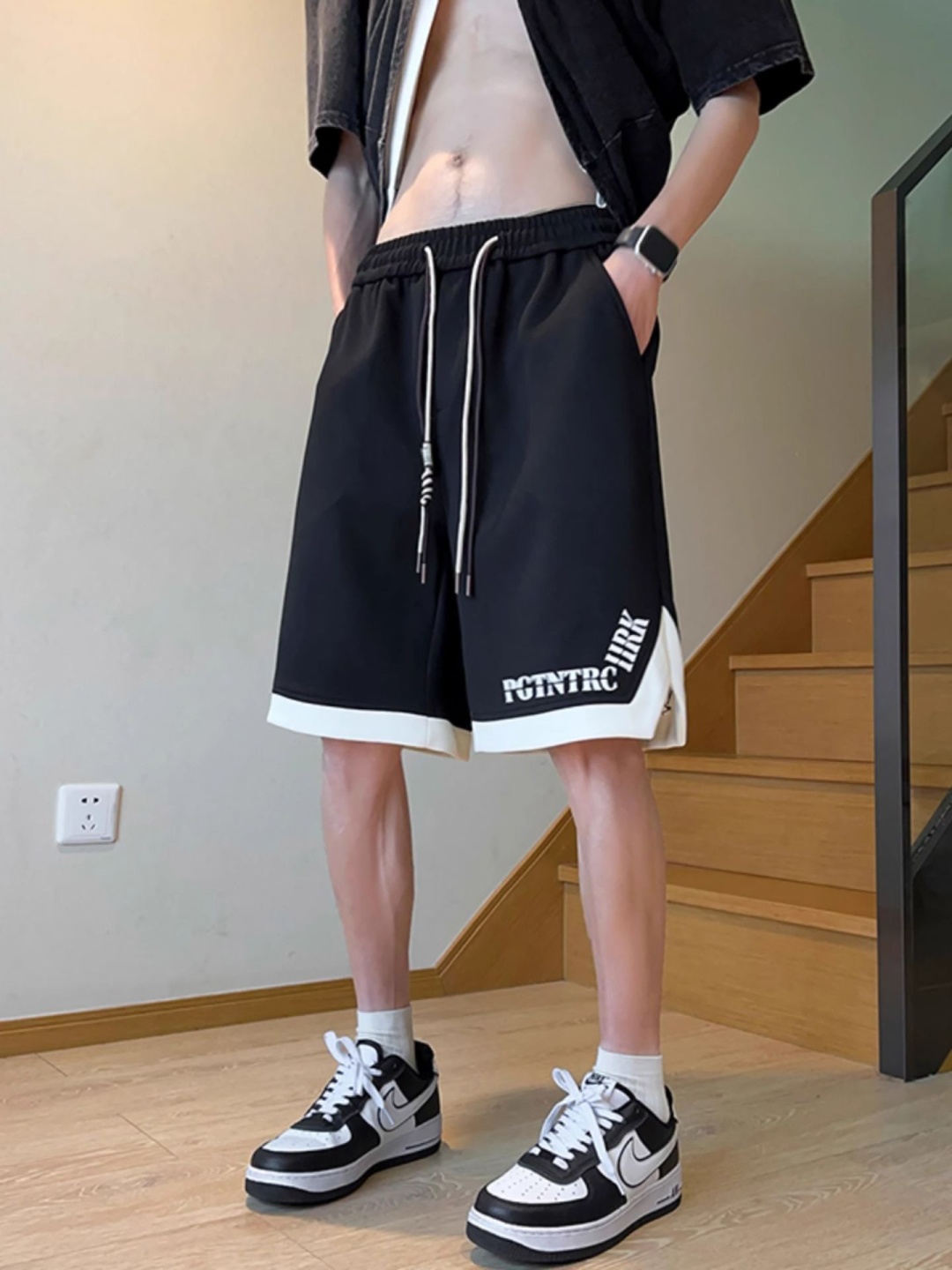 

StyleCast x Revolte Men Printed Regular Fit Mid-Rise Shorts, Black