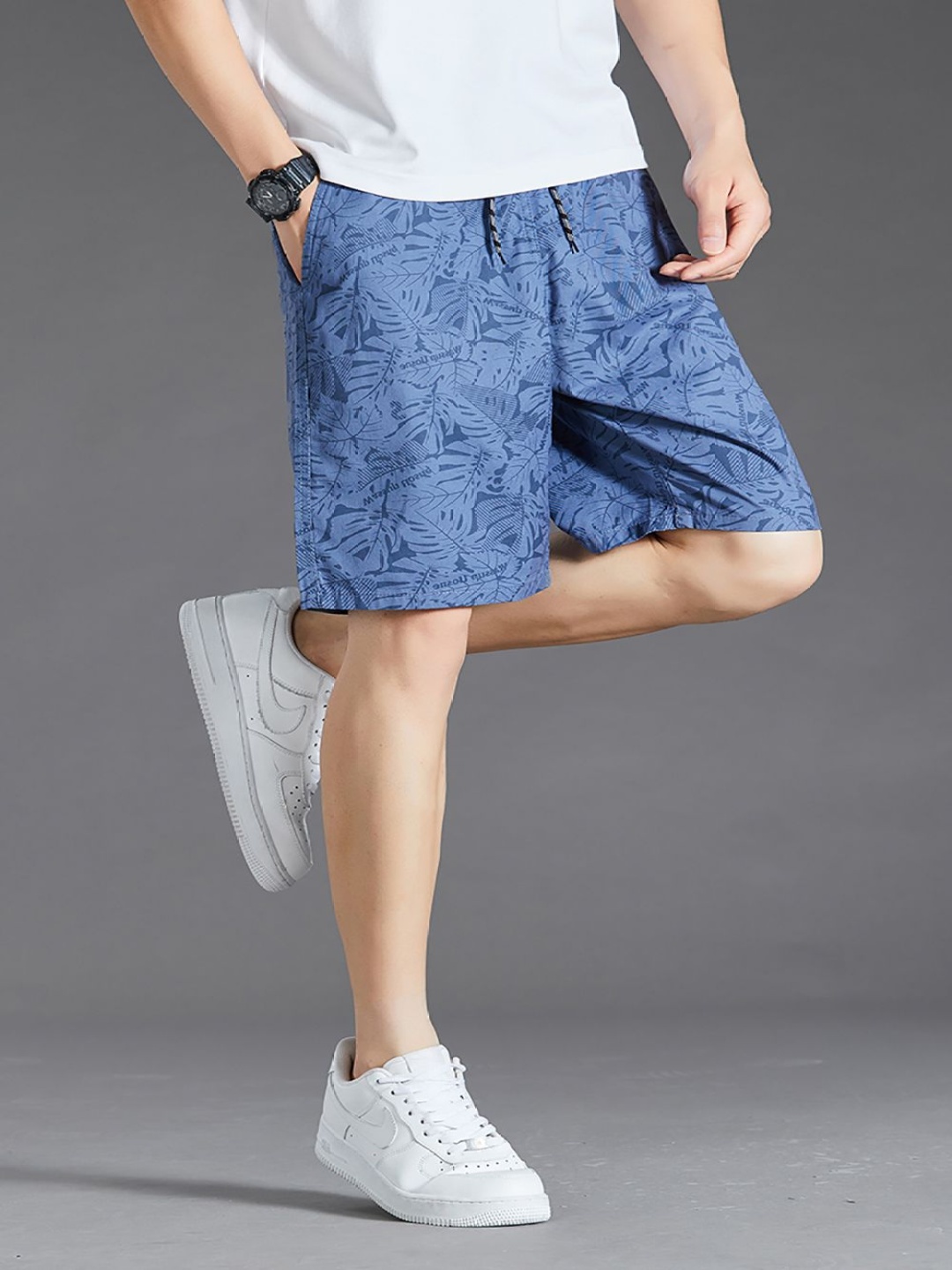 

StyleCast x Revolte Men Conversational Printed Shorts, Blue