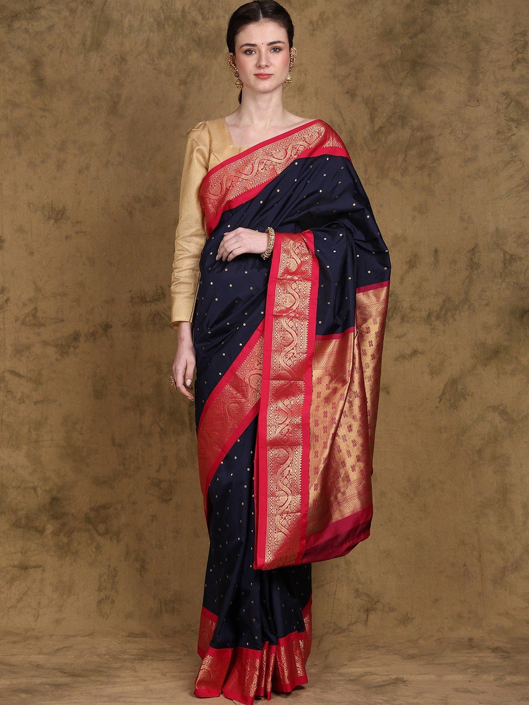 

Exotic India Evening Blue Pure Silk Zari work Saree with Peacock Contrast Border