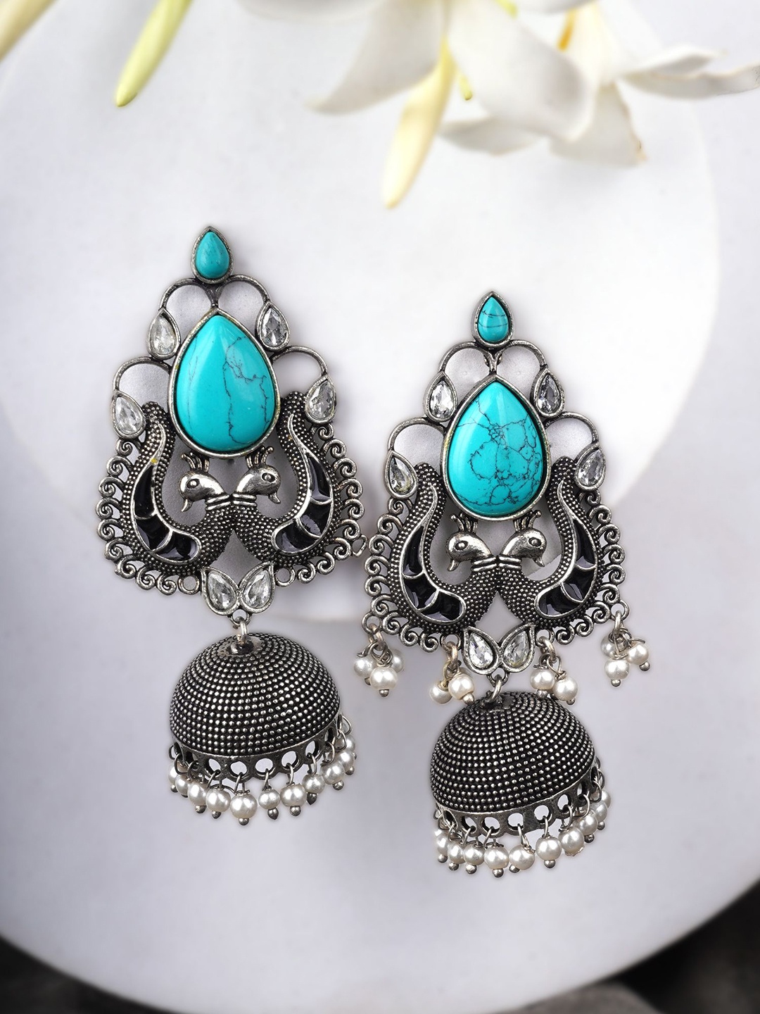 

Adwitiya Collection Silver Plated Artificial Stone-Studded Peacock Shaped Jhumkas