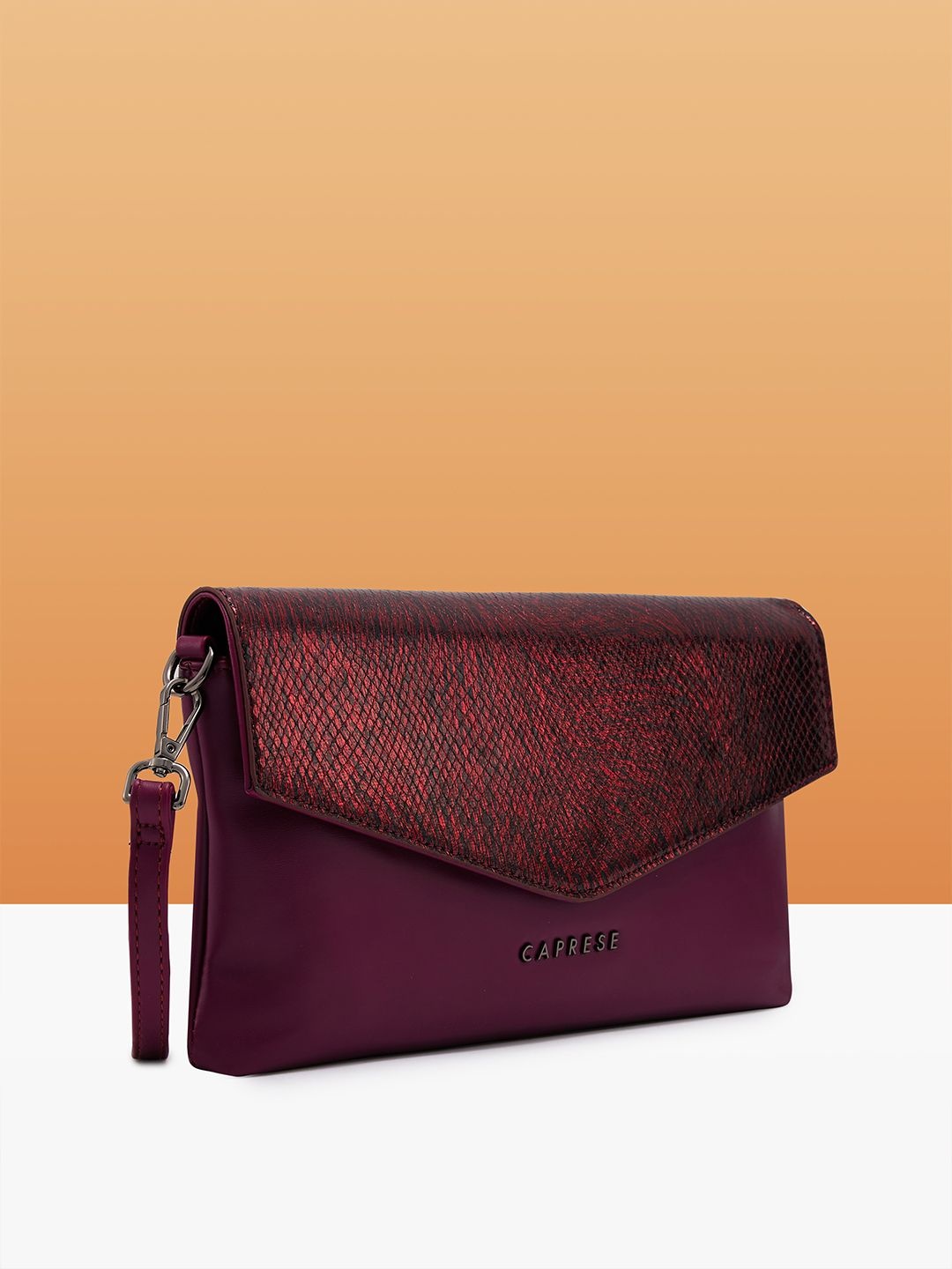 

Caprese Women Colourblocked Structured Leather Handheld Bag, Red