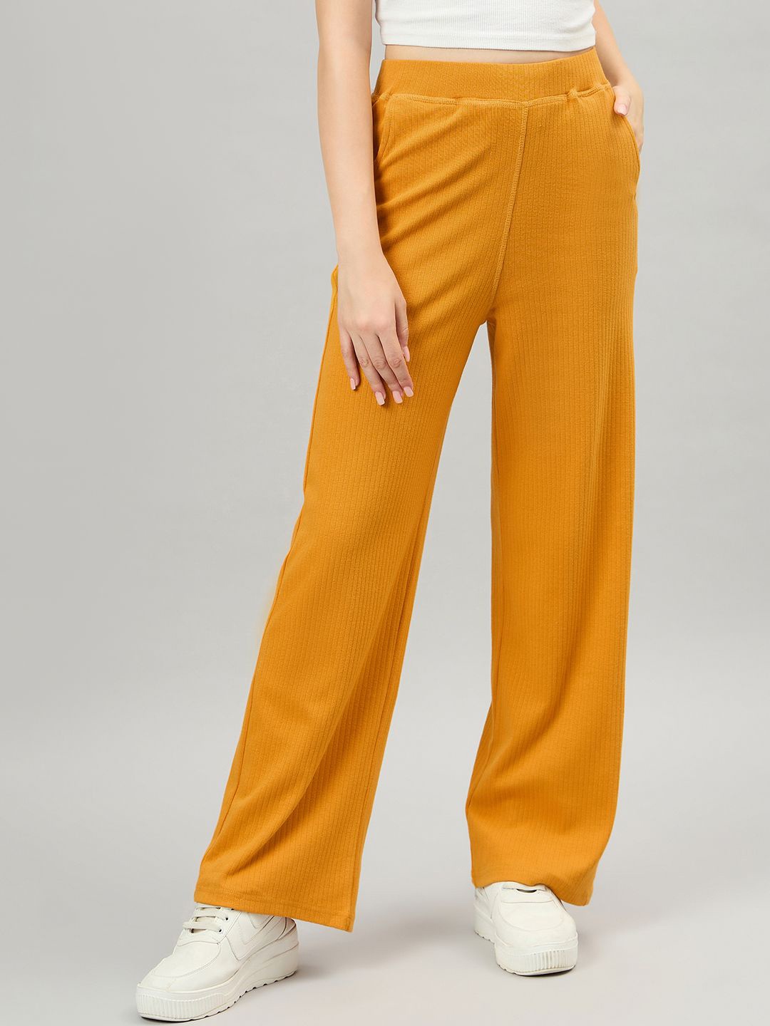 

FEMEA Women Flared Mid Rise Track Pants, Yellow