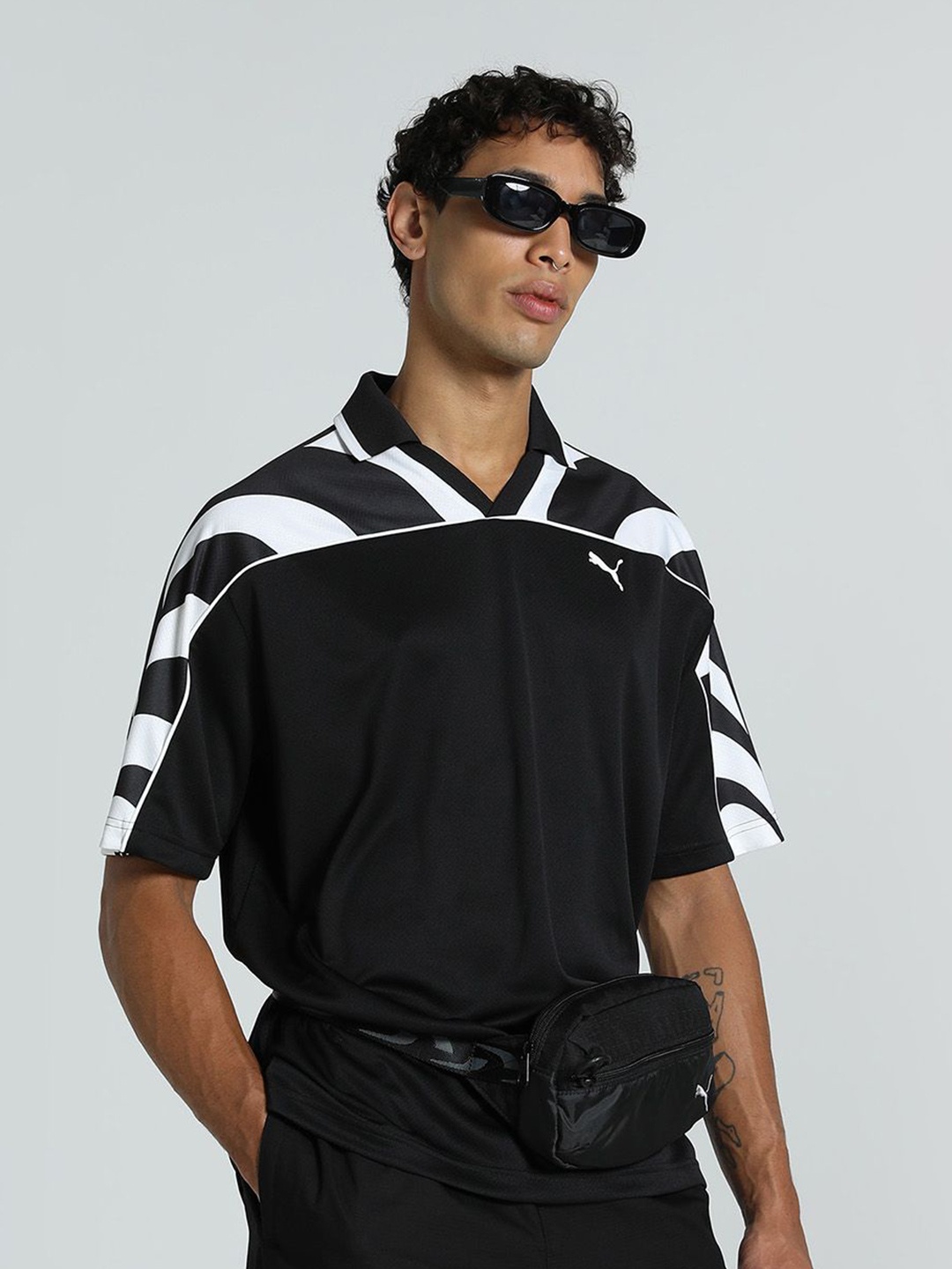 

Puma Future. Puma. Archive Printed Relaxed Fit Short Sleeve Football Jersey, Black