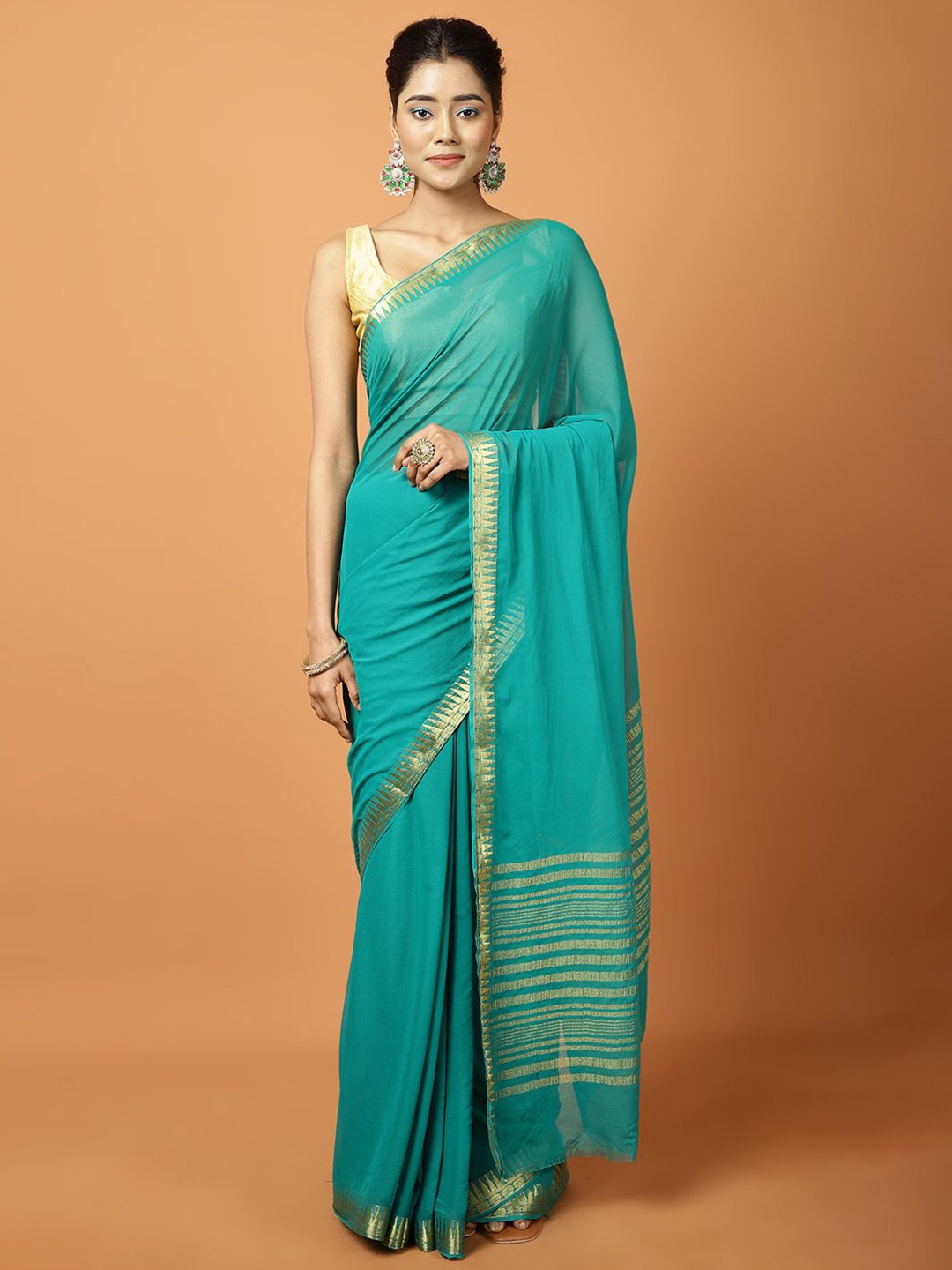 

Meena Bazaar Woven Design Border Solid Saree, Sea green