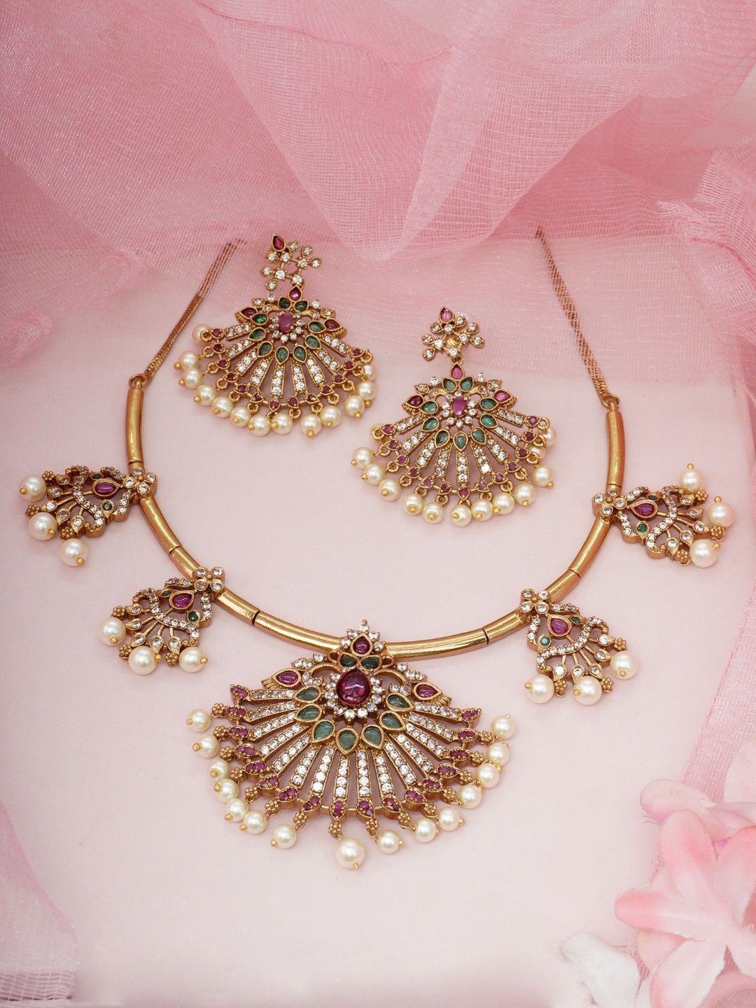 

Niscka Gold-Plated Artificial Stones Studded And Beaded Jewellery Set