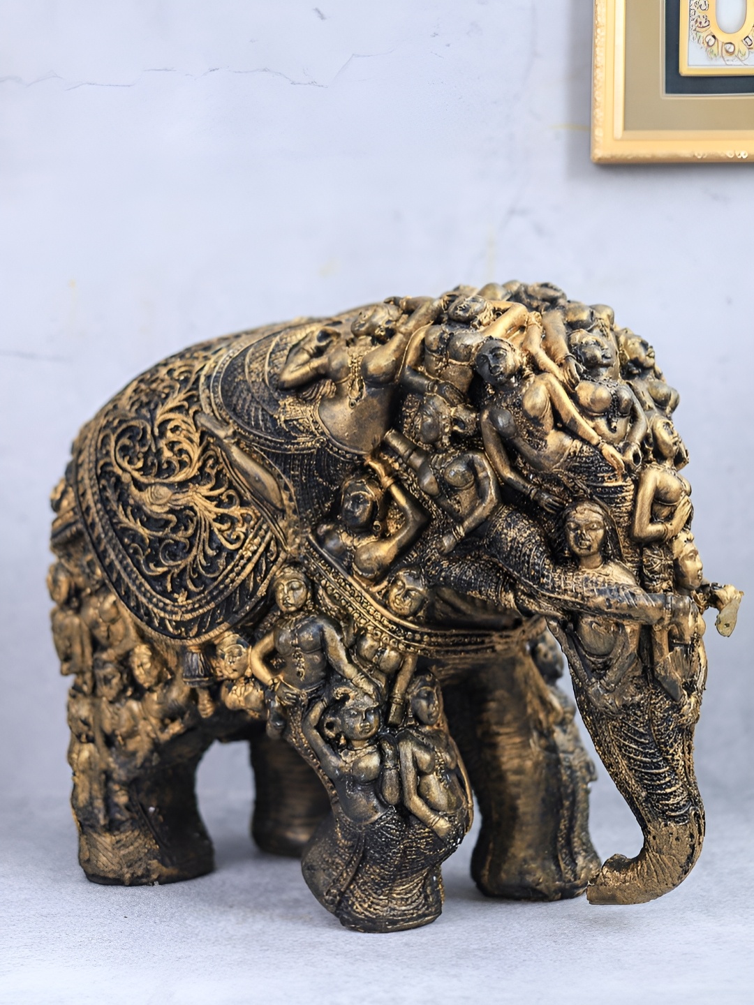 

The Advitya Gold-Toned And Black Elephant Figurine Showpiece