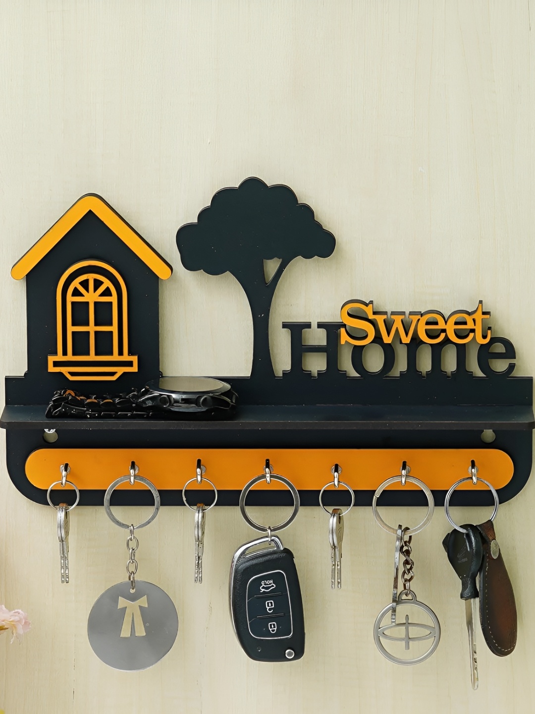 

Webelkart Orange-Coloured & Black Textured Wooden Key Holder