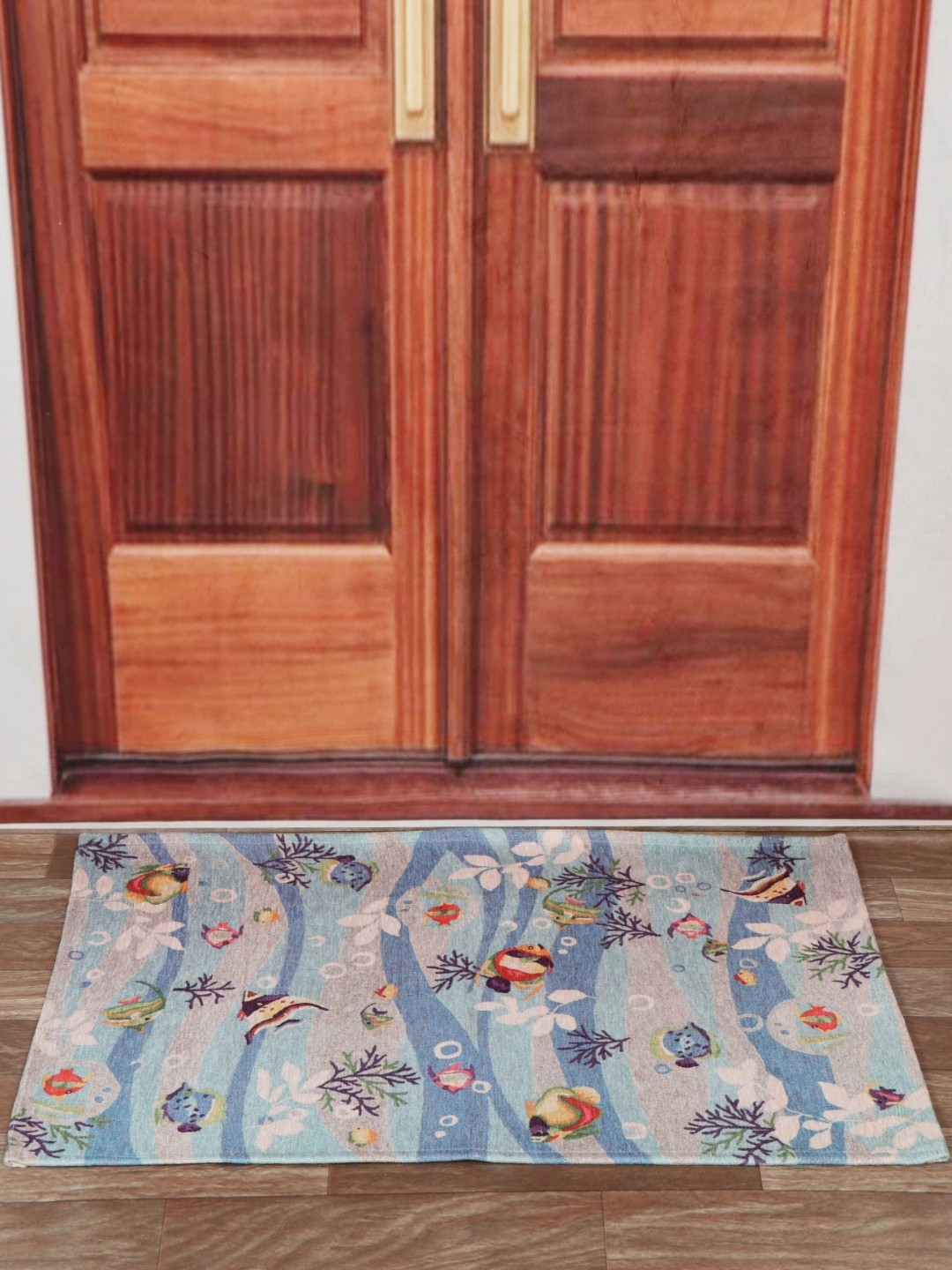 

Aura Blue & White Fishes Printed Anti Skid Doormat