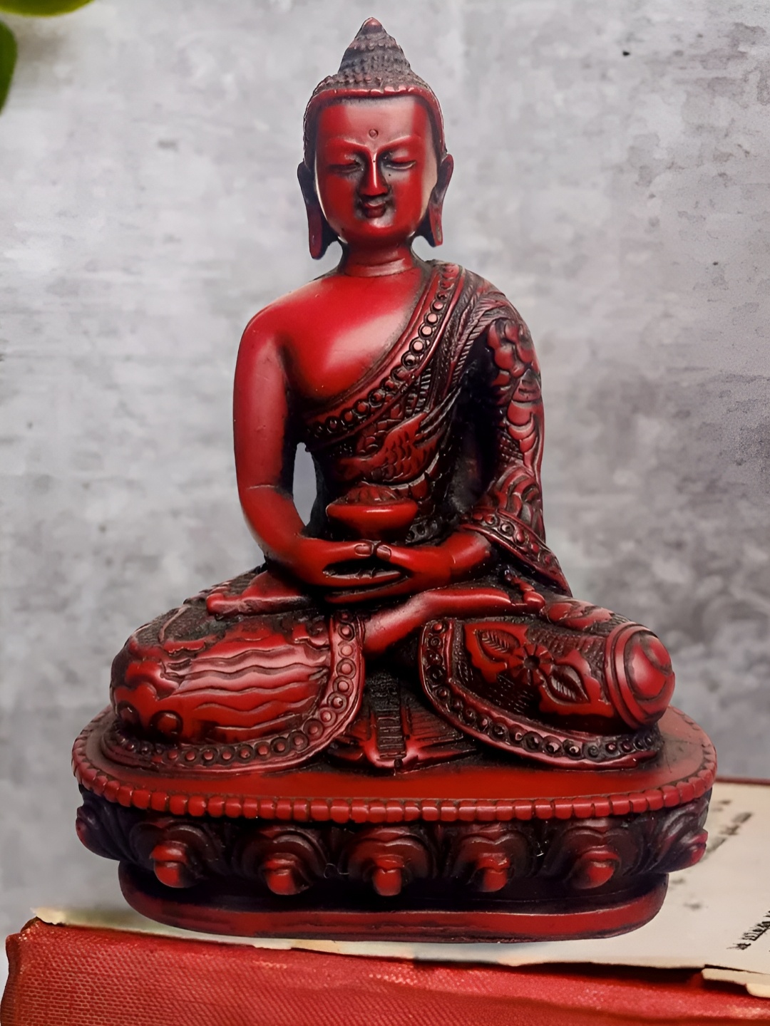 

The Advitya Maroon And Gold-Toned Lord Buddha Idol Showpiece