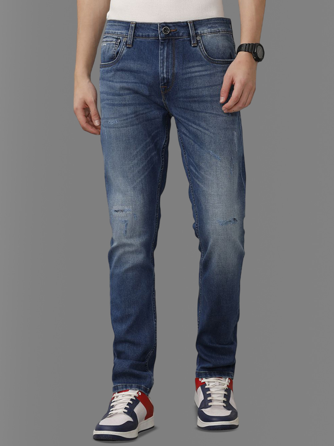 

Voi Jeans Men Cotton Skinny Fit Mid-Rise Mildly Distressed Stretchable Jeans, Blue