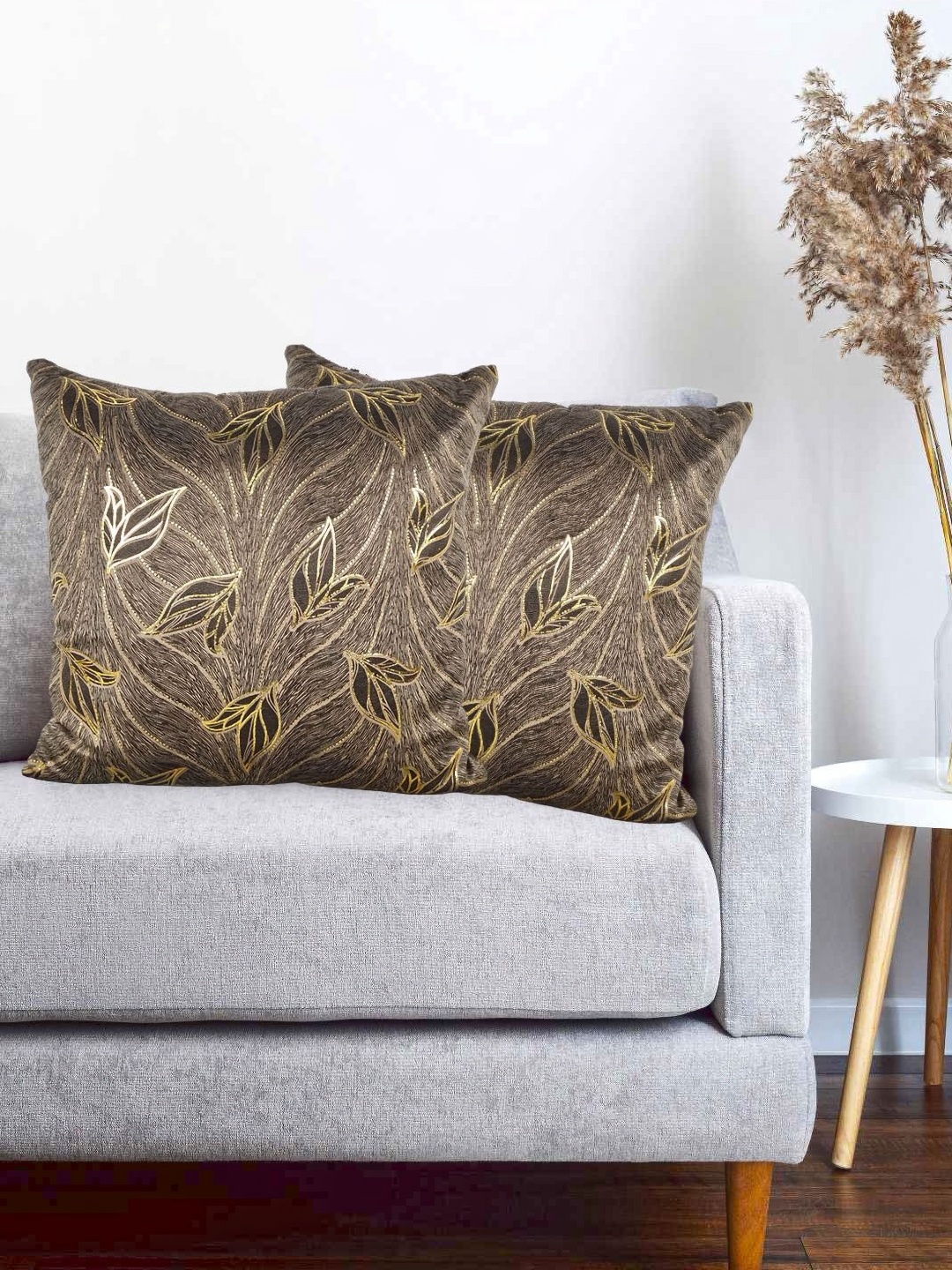 

Vinayaka Fab Brown 2 Pieces Floral Embroidered Velvet Square Shaped Cushion Covers