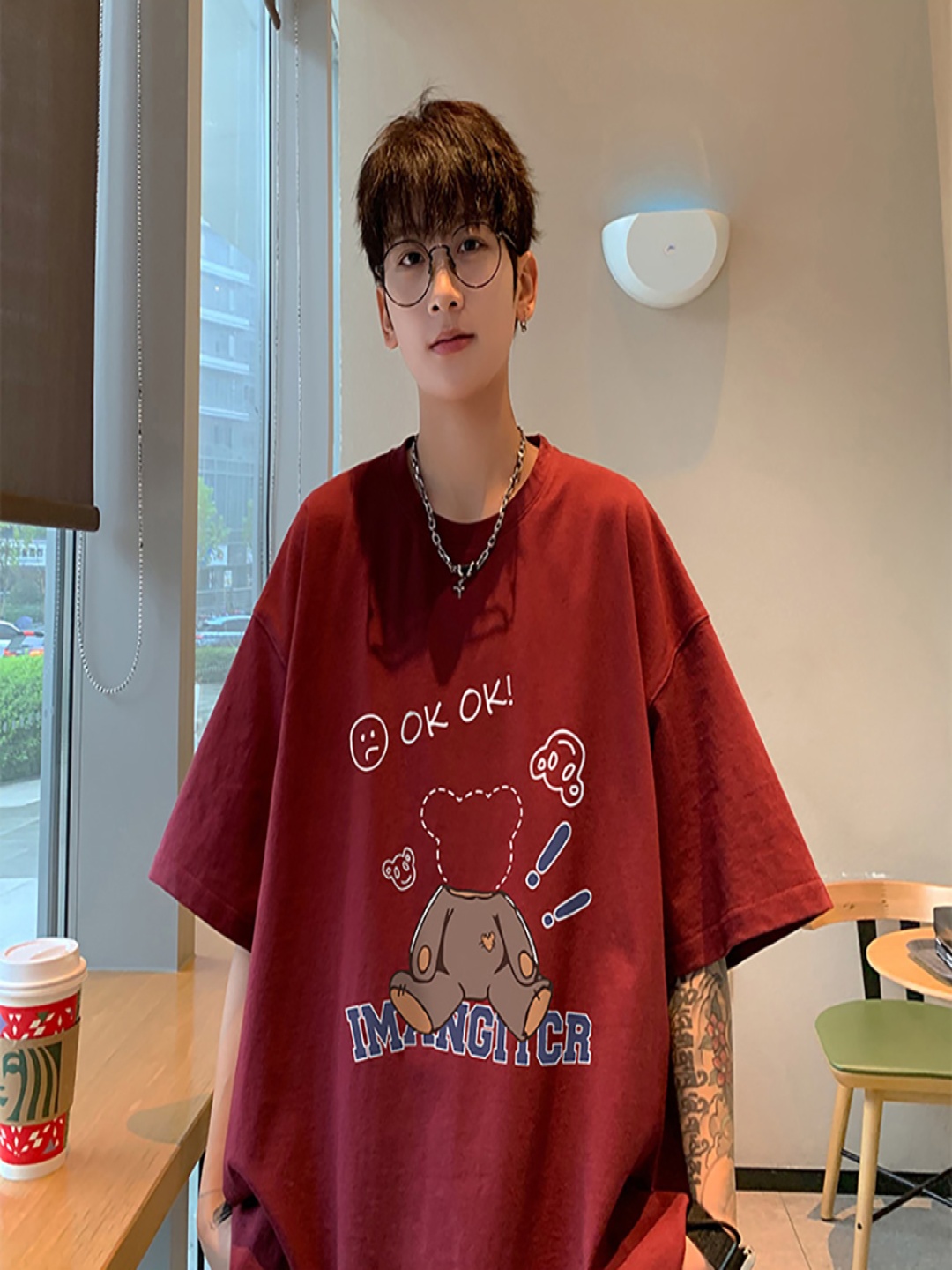 

StyleCast x Revolte Men Graphic Printed Round Neck Cotton Oversized T-shirt, Maroon