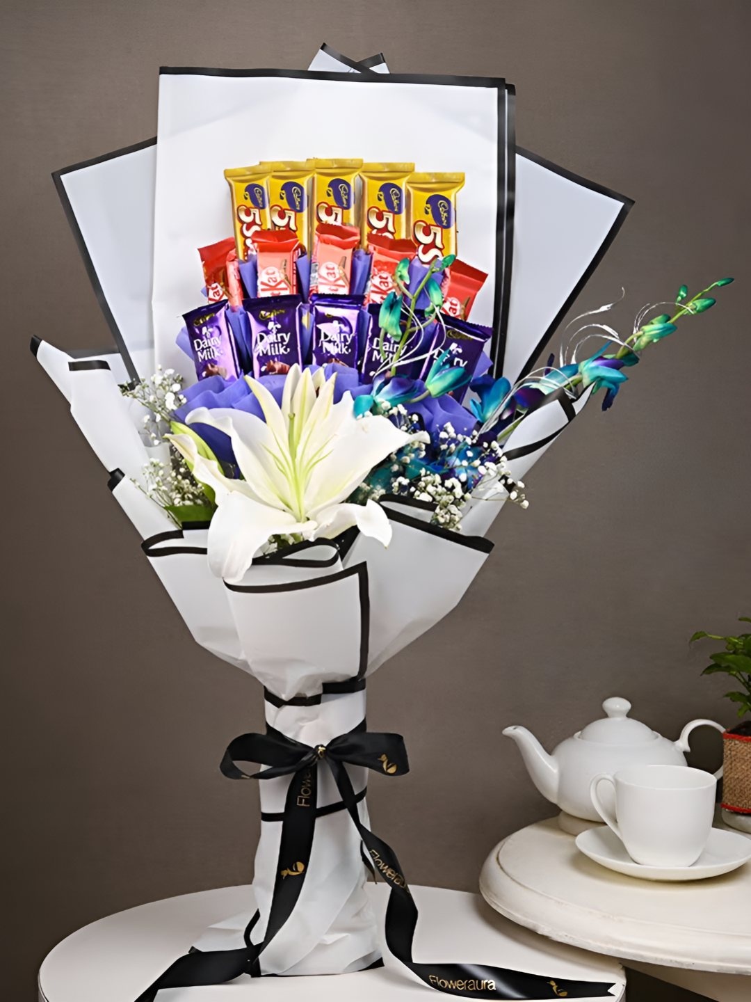 

Floweraura 16Pcs Flower Bouquet of Lily Flower With Mix Chocolates Gift Set, Blue