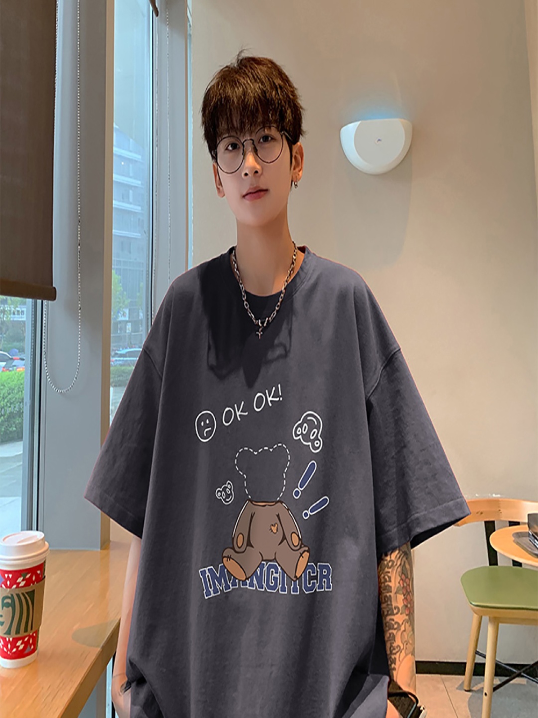 

StyleCast x Revolte Men Graphic Printed Round Neck Cotton Oversized T-shirt, Grey