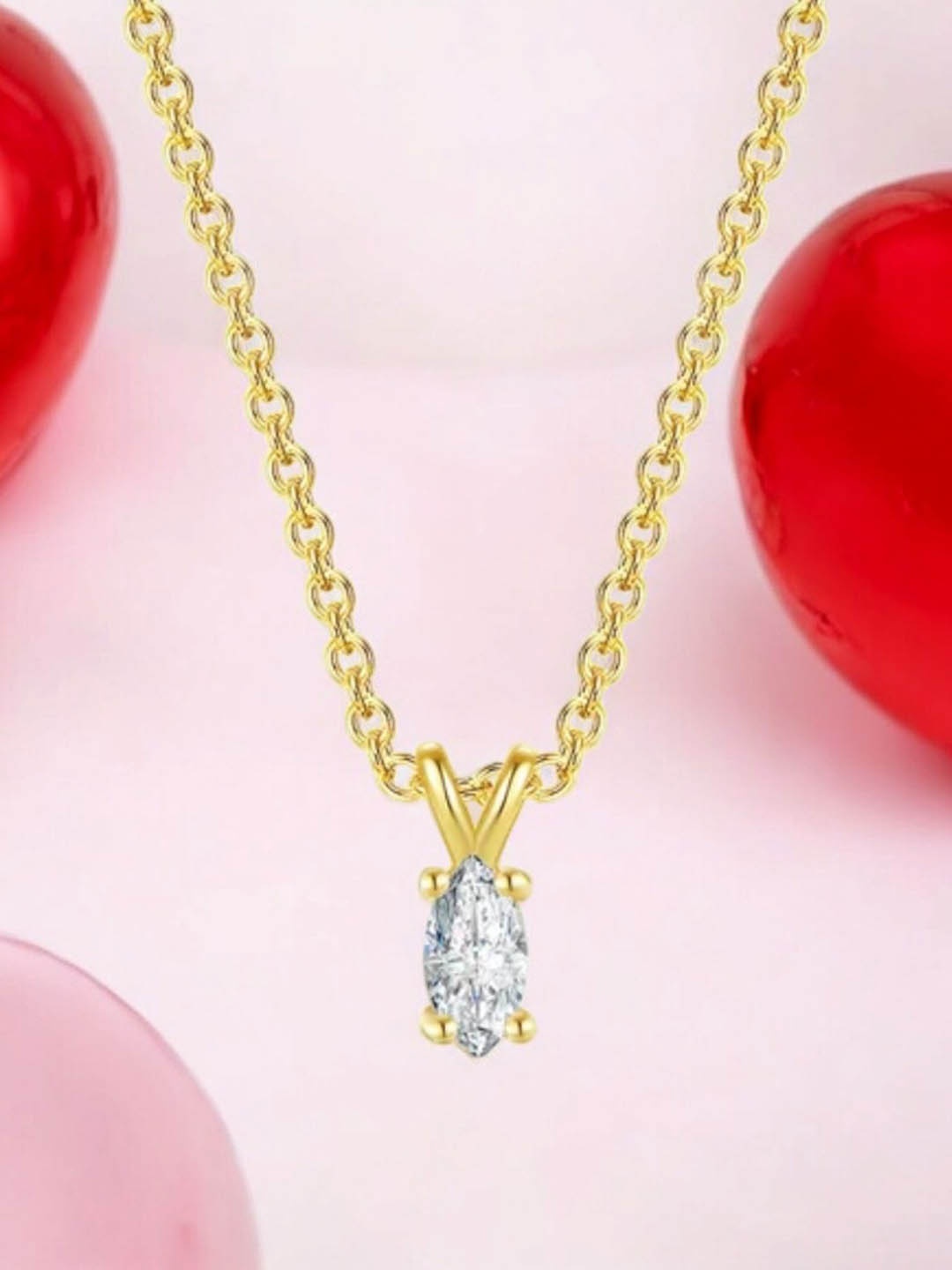 

Nilu's Collection Gold-Plated Cubic Zirconia Studded Solitaire Pendant With Chain