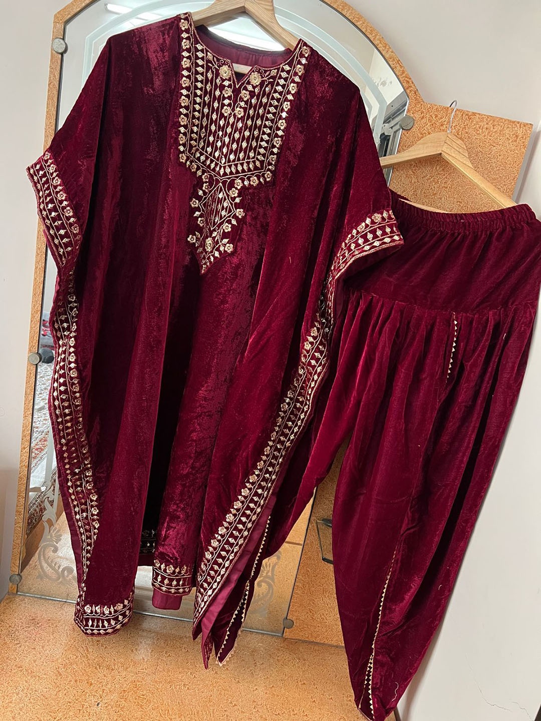 

ZIBLON Women Ethnic Motifs Embroidered Regular Thread Work Velvet Kurta with Dhoti Pants, Maroon