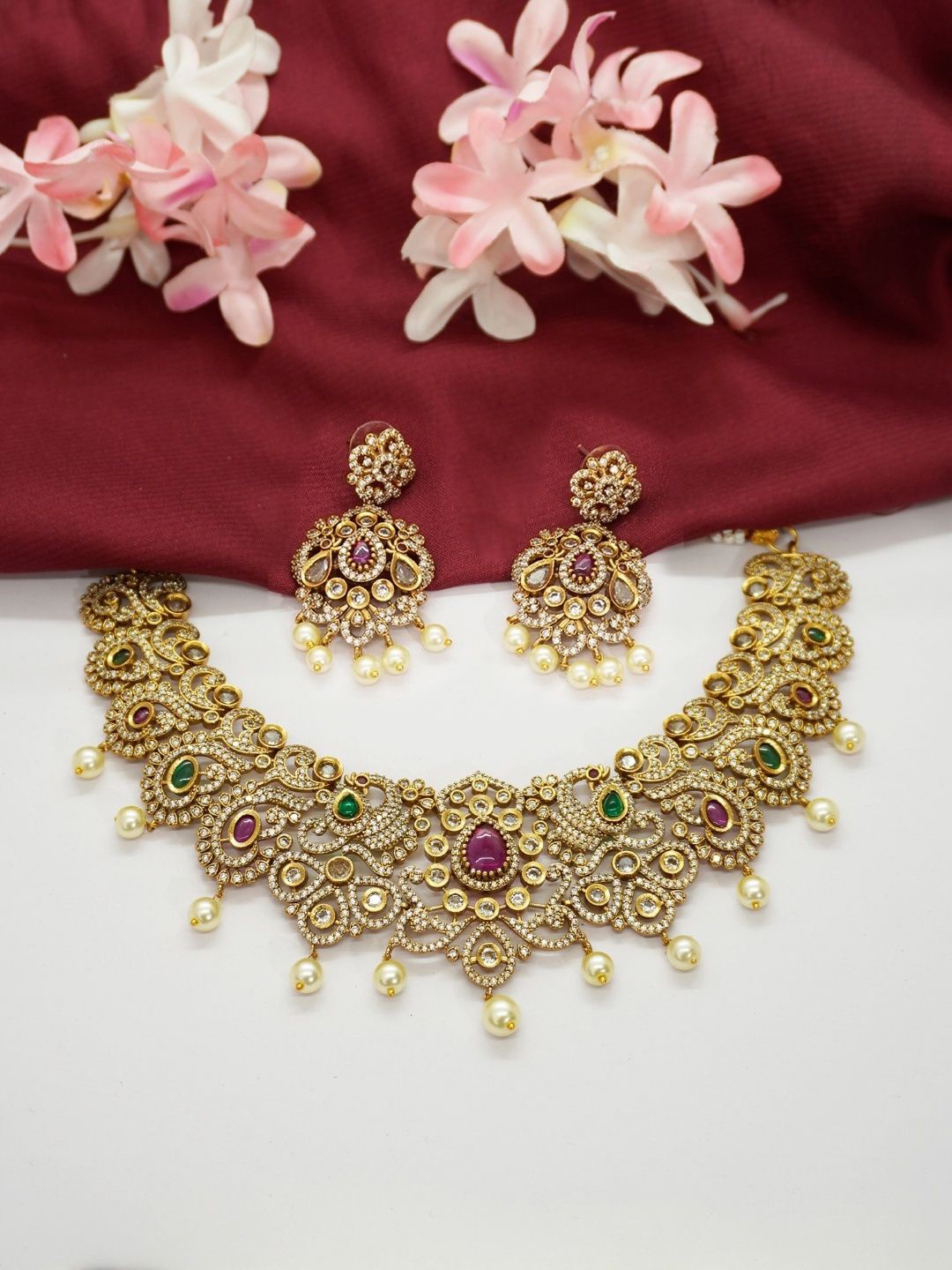 

Niscka Gold-Plated Artificial Stone Studded Jewellery Set