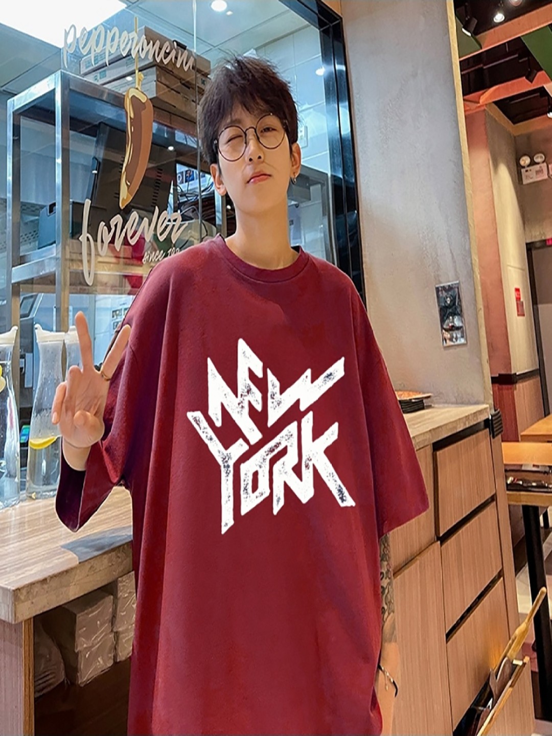 

StyleCast x Revolte Men Typography Printed Round Neck Oversized T-shirt, Maroon