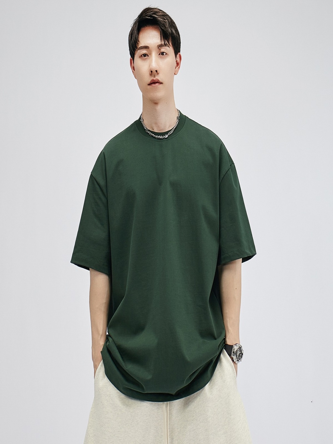 

StyleCast x Revolte Men Solid Round Neck Cotton T-shirt, Green