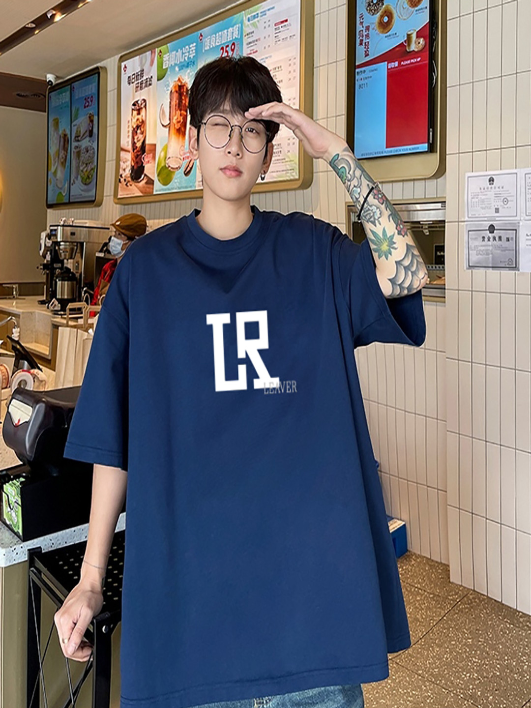 

StyleCast x Revolte Men Graphic Printed Round Neck Cotton Oversized T-shirt, Navy blue