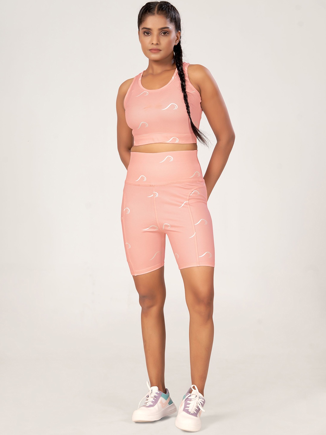 

POOJARAN Women Abstract Printed Round Neck Tracksuits, Peach