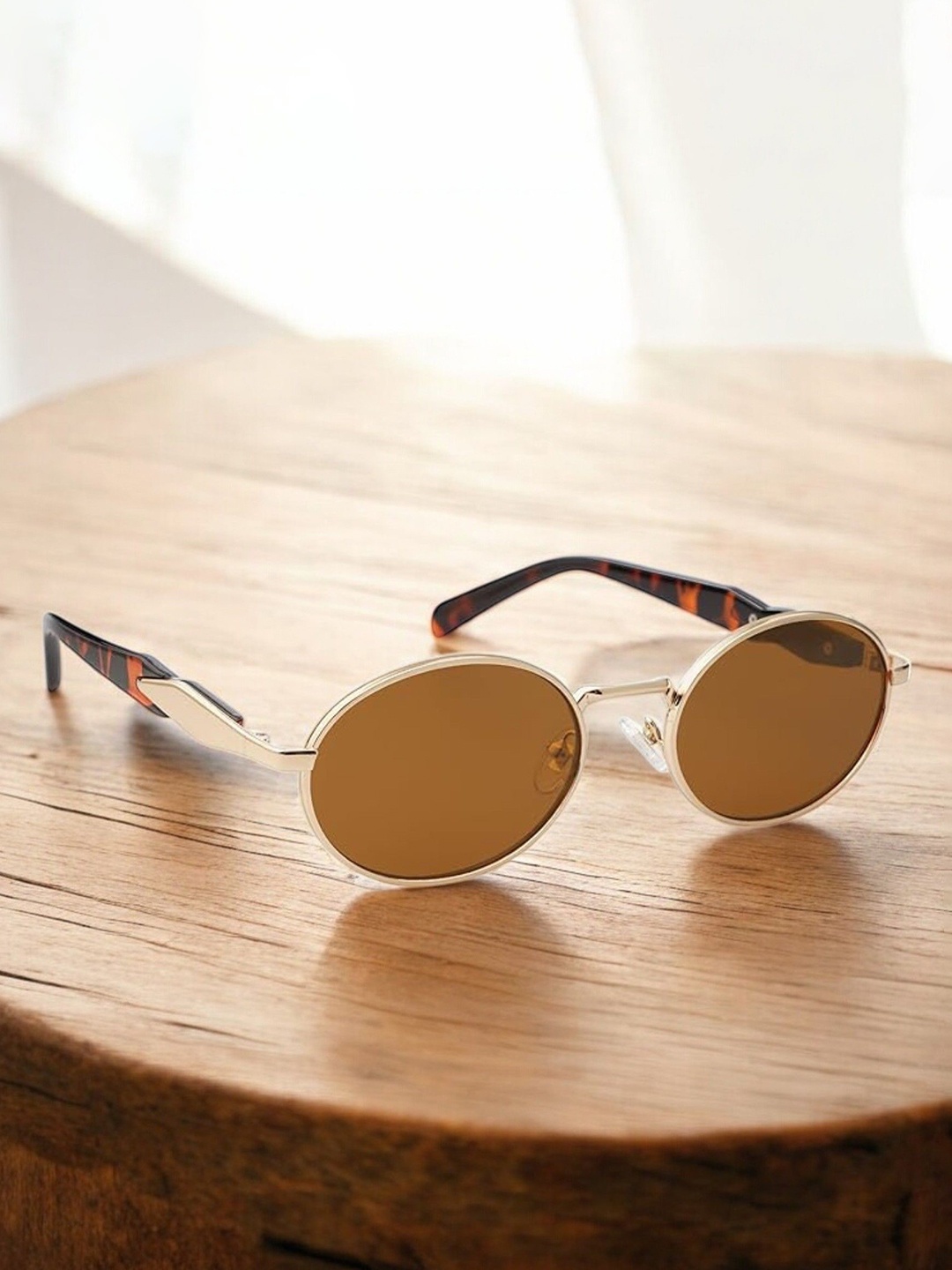 

DressBerry Women Oval Sunglasses with UV Protected Lens PUSHPA gold brown