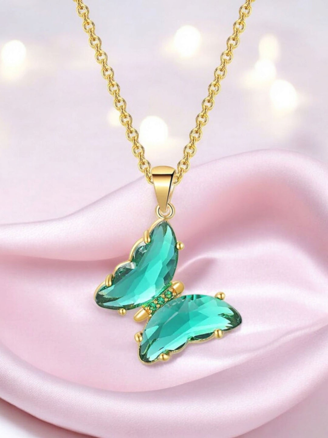 

Nilu's Collection Gold-Plated Cubic Zirconia Studded Butterfly Pendant With Chain