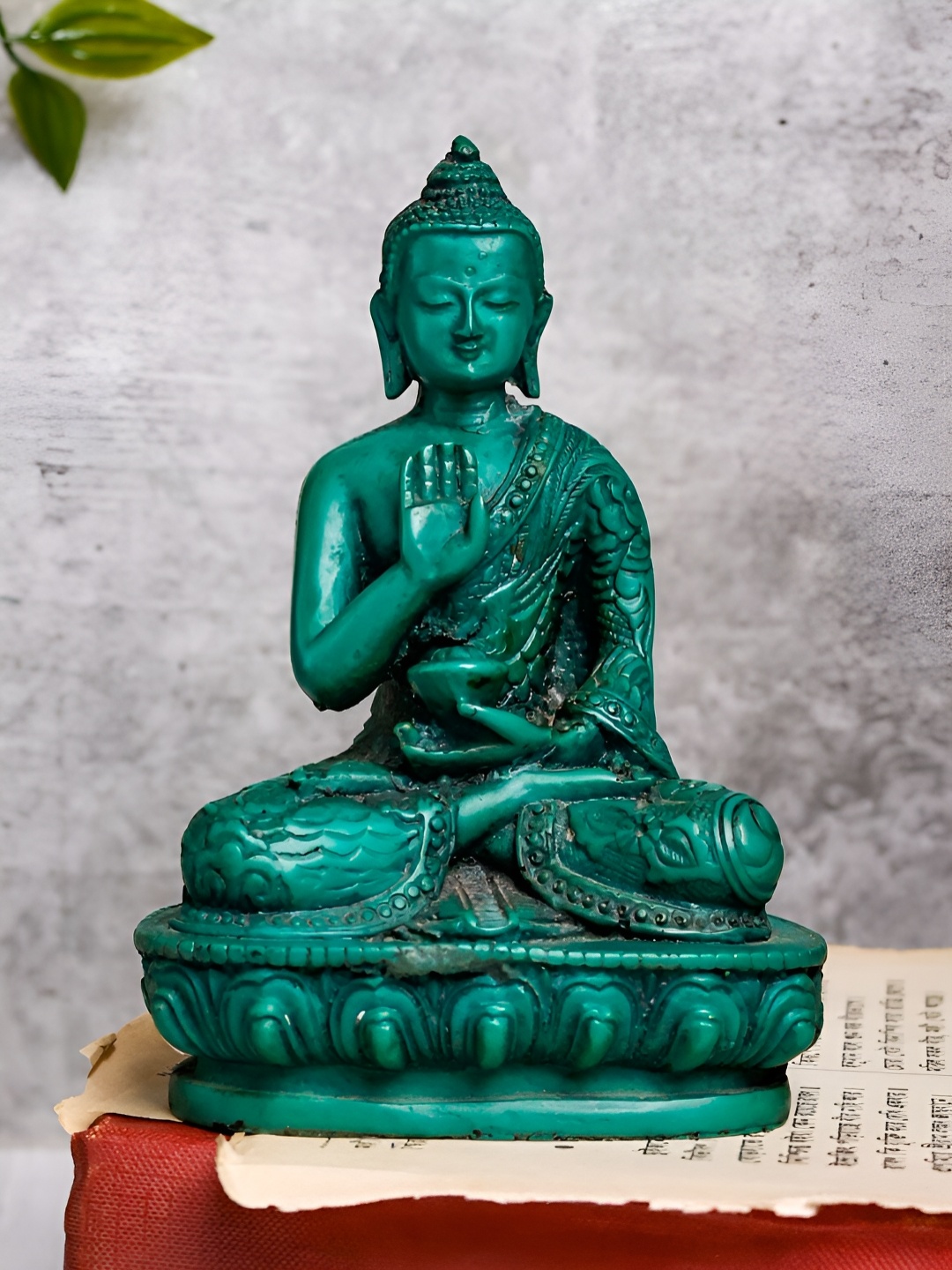 

The Advitya Green Blessing Buddha Idol Showpiece