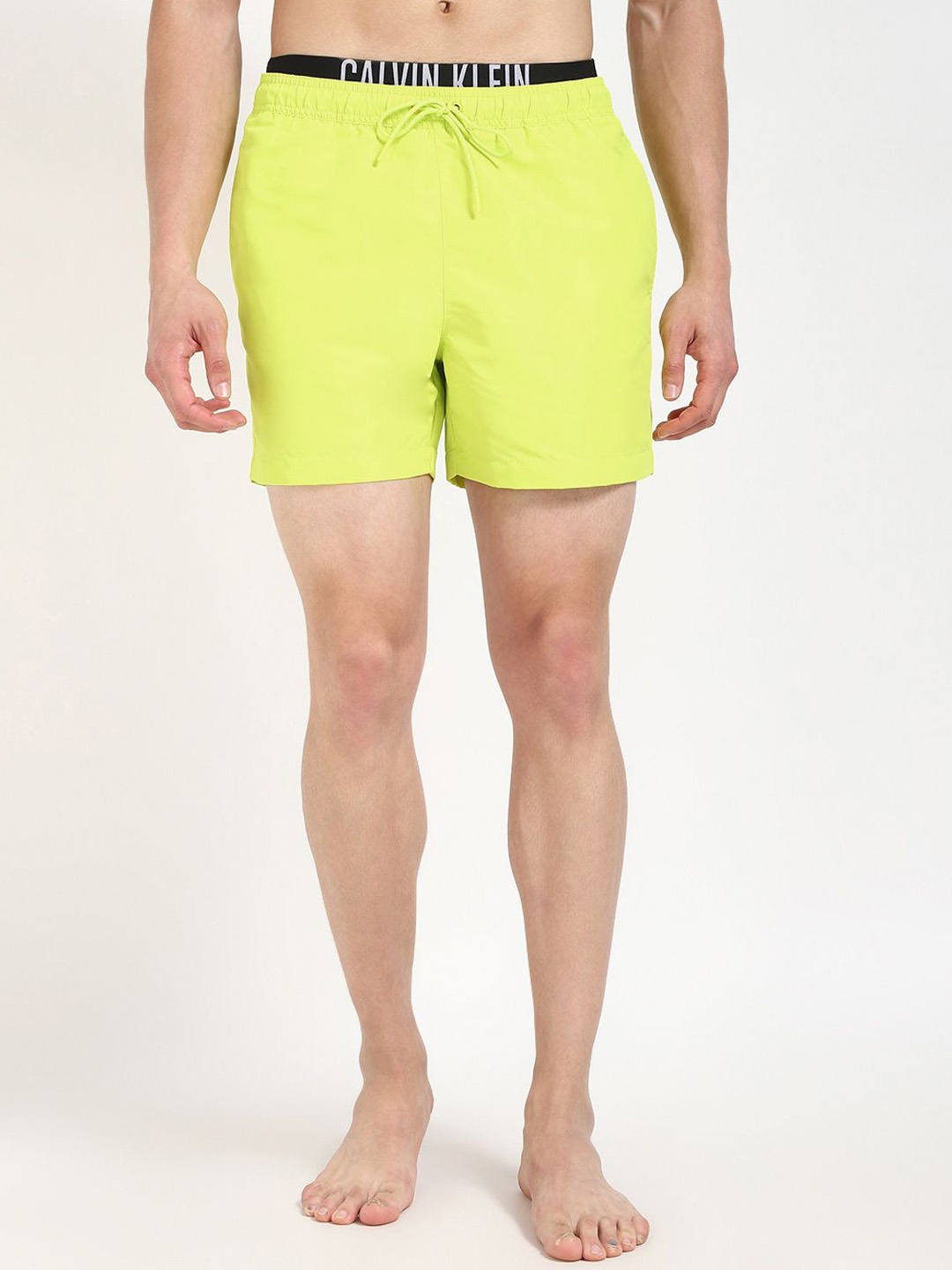 

Calvin Klein Men Low-Rise Regular Shorts, Yellow