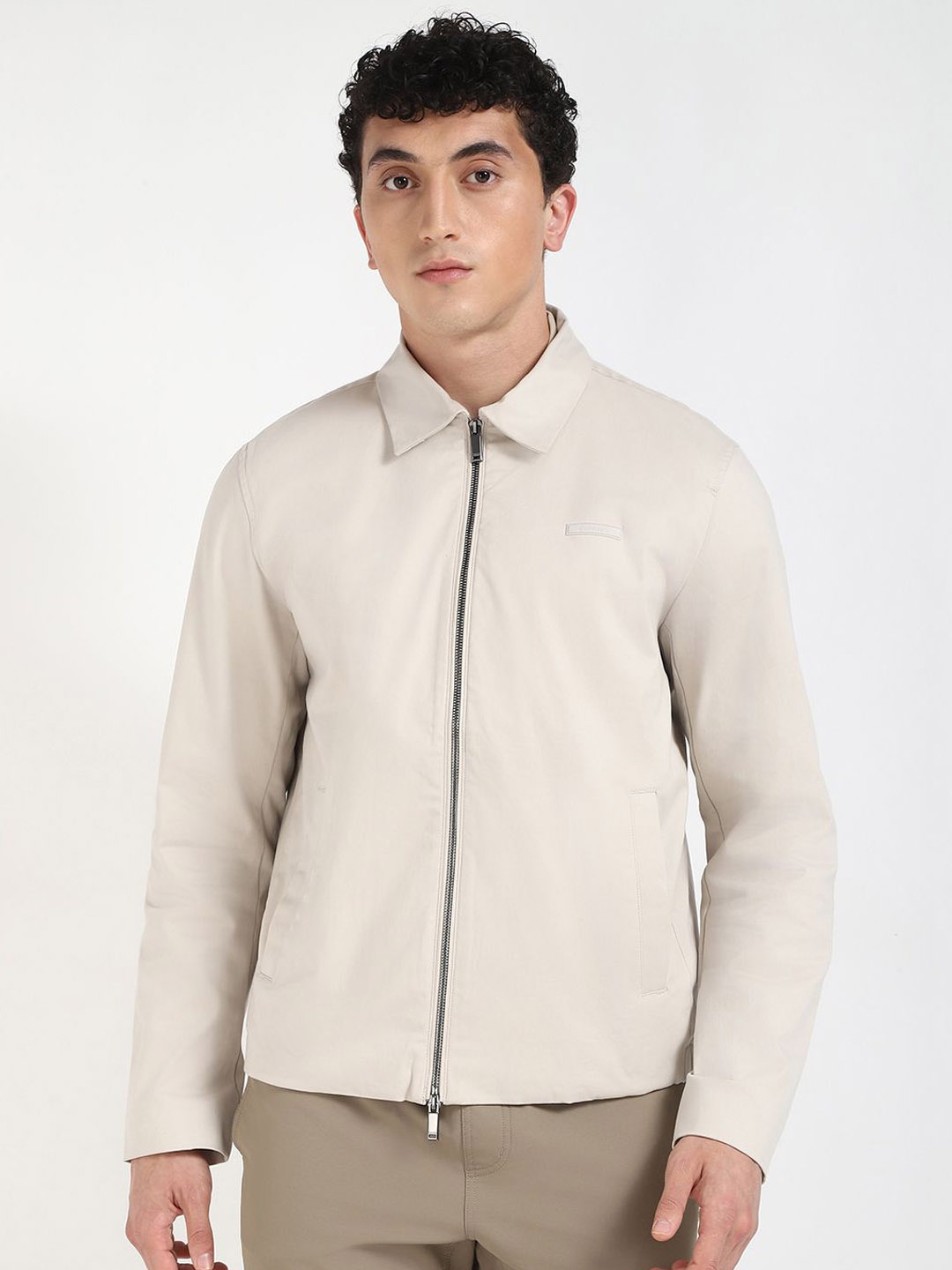 

Calvin Klein Men Spread Collar Solid Cotton Casual Bomber Jacket, Off white