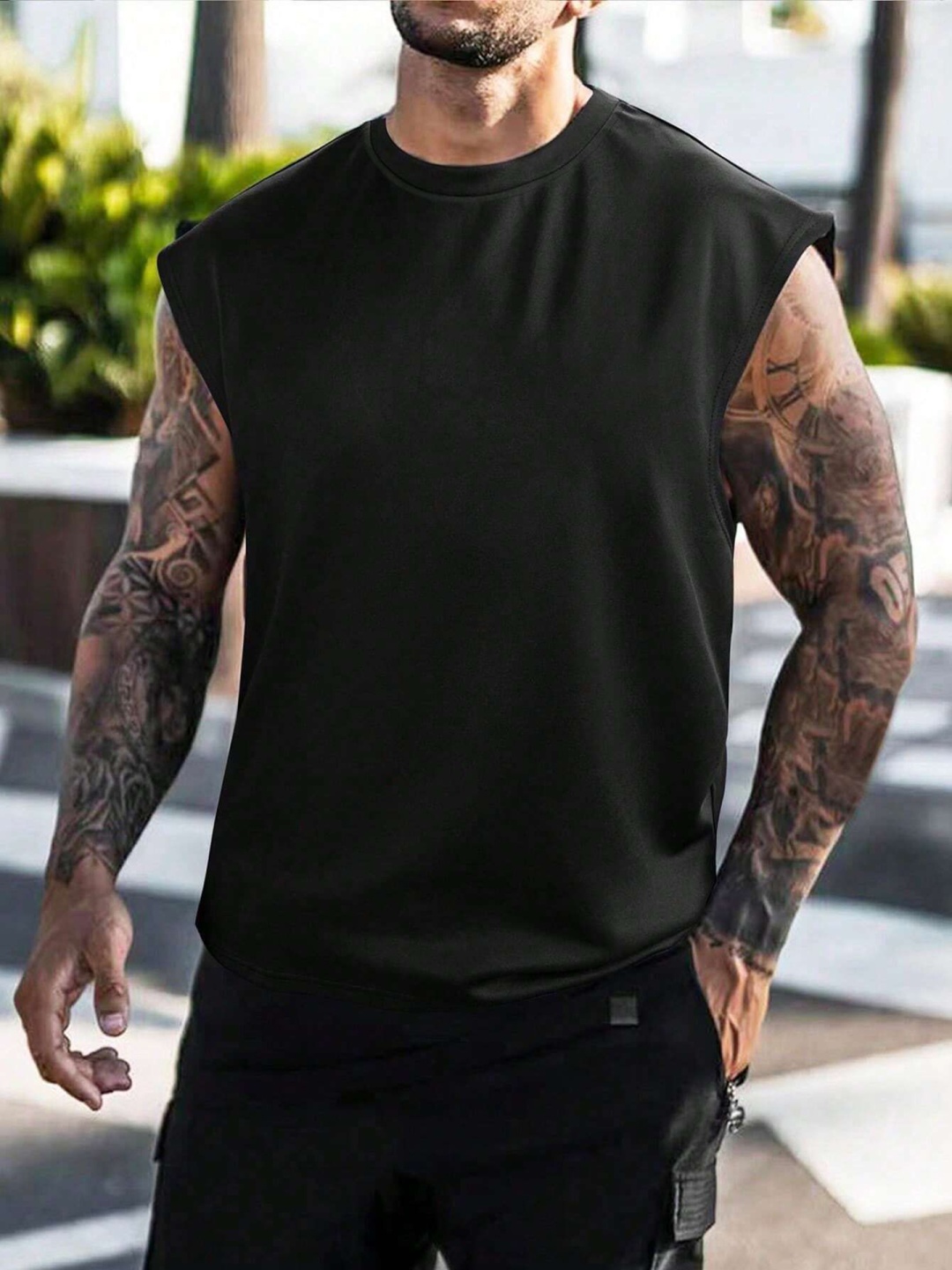 

StyleCast x Revolte Men Solid Round Neck T-shirt, Black