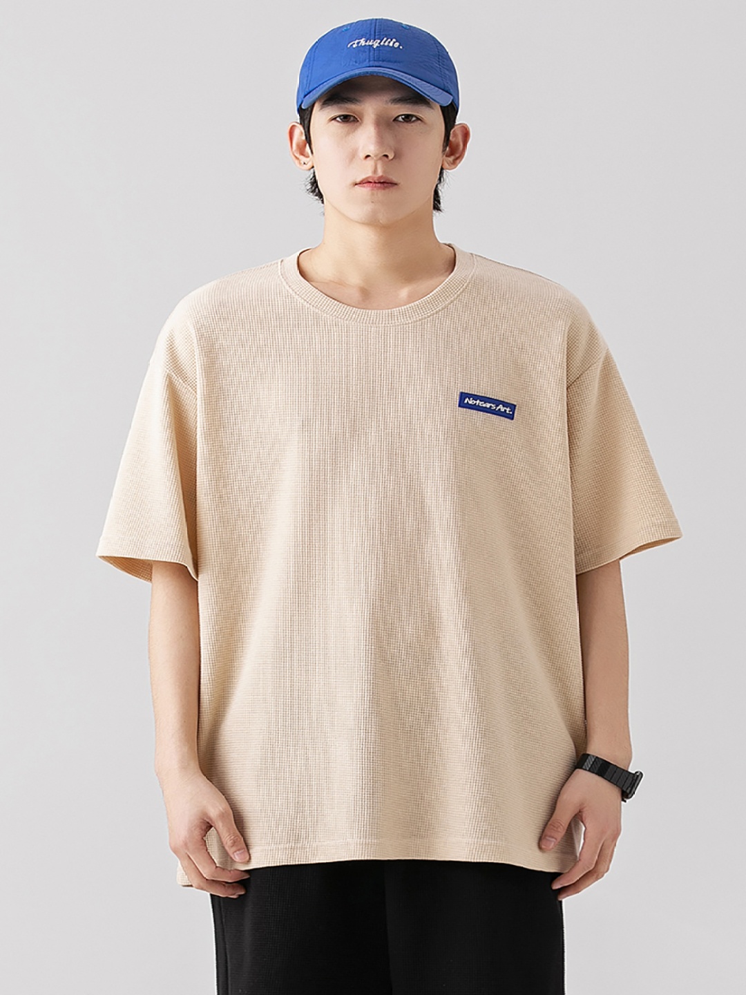 

StyleCast x Revolte Men Solid Round Neck Relaxed Fit T-shirt, Beige