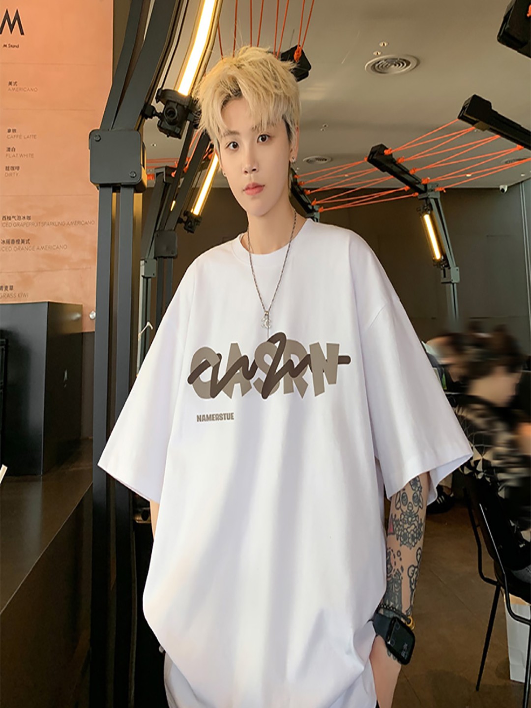 

StyleCast x Revolte Men Typography Printed Round Neck Oversized T-shirt, Grey