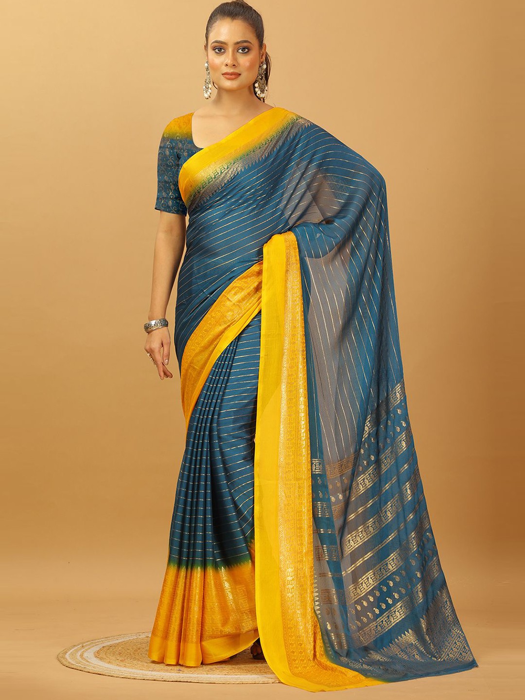 

A.V.M. SILK MILLS Striped Zari Pure Crepe Saree, Green
