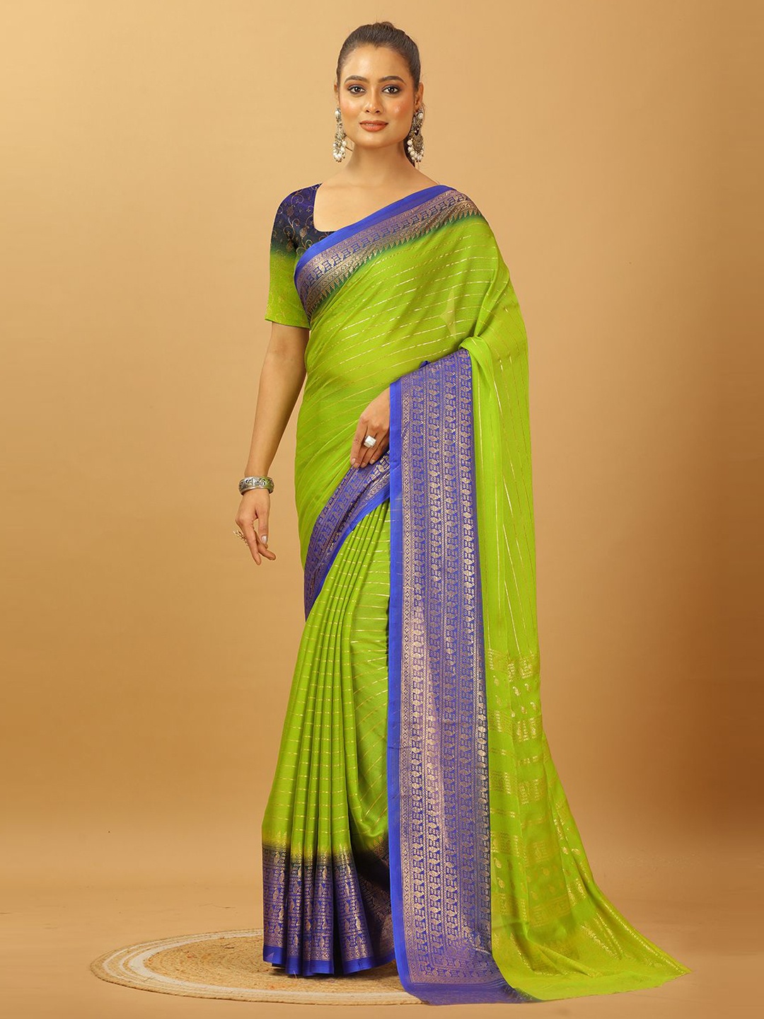 

A.V.M. SILK MILLS Woven Design Zari Pure Crepe Saree, Green