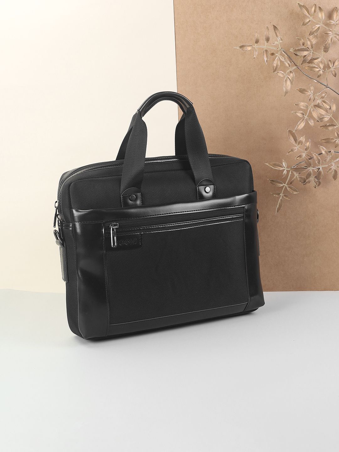 

Mochi Women Solid Laptop Bag, Black