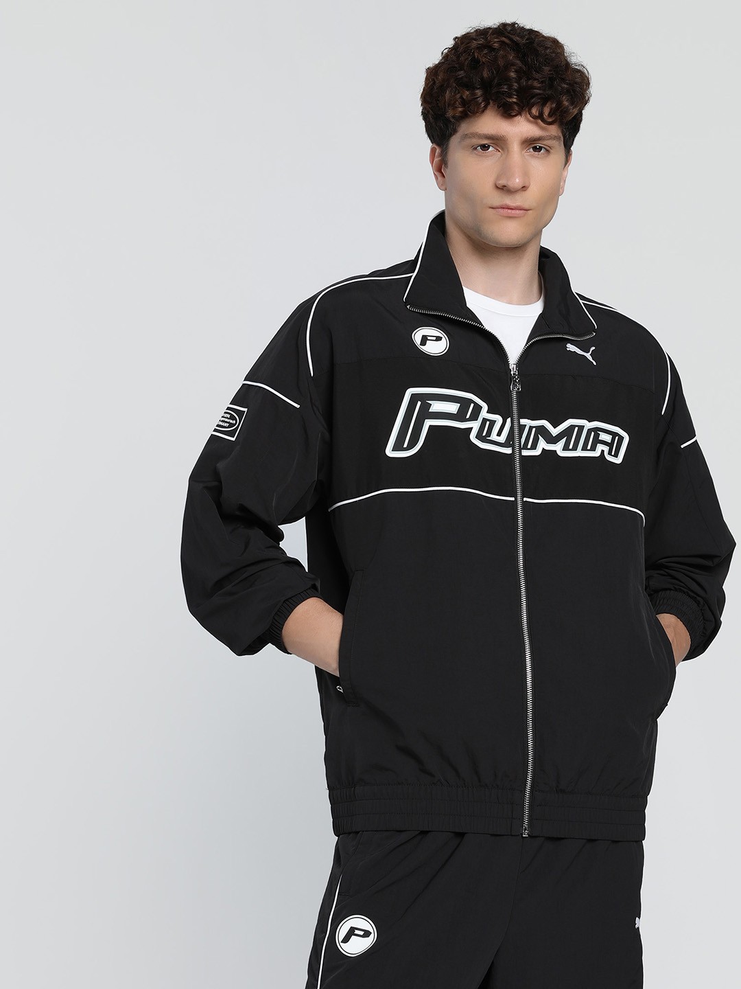 

Puma SDS Men dryCELL Typography Printed Relaxed Fit Track Sporty Jacket, Black