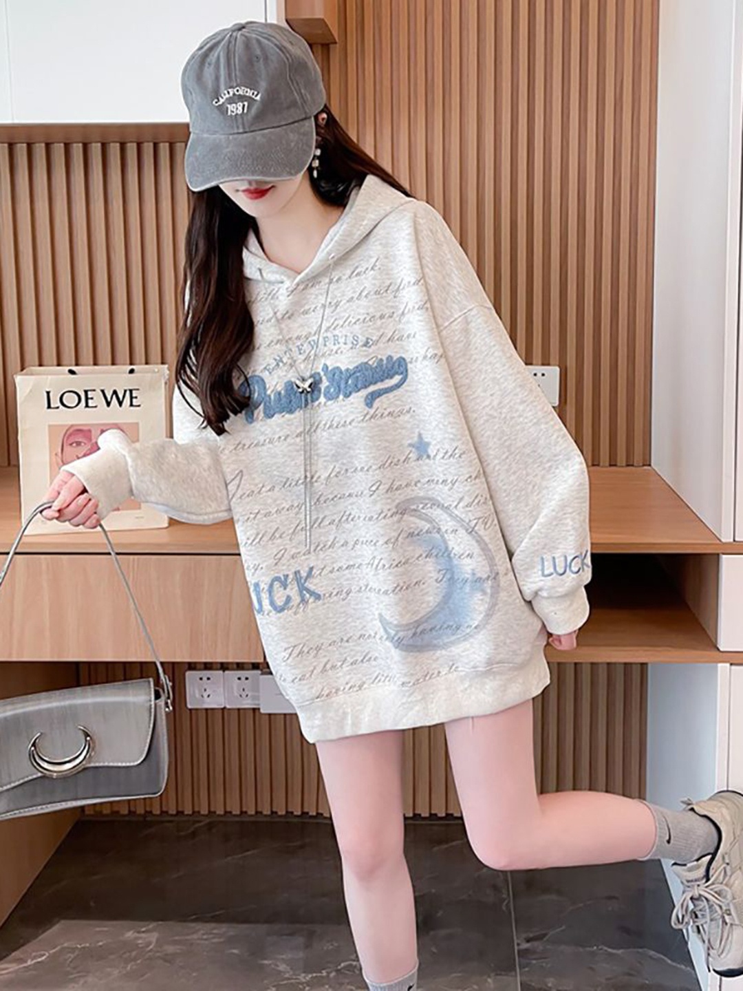 

StyleCast x Revolte Women Hooded Printed Longline Sweatshirt, Grey