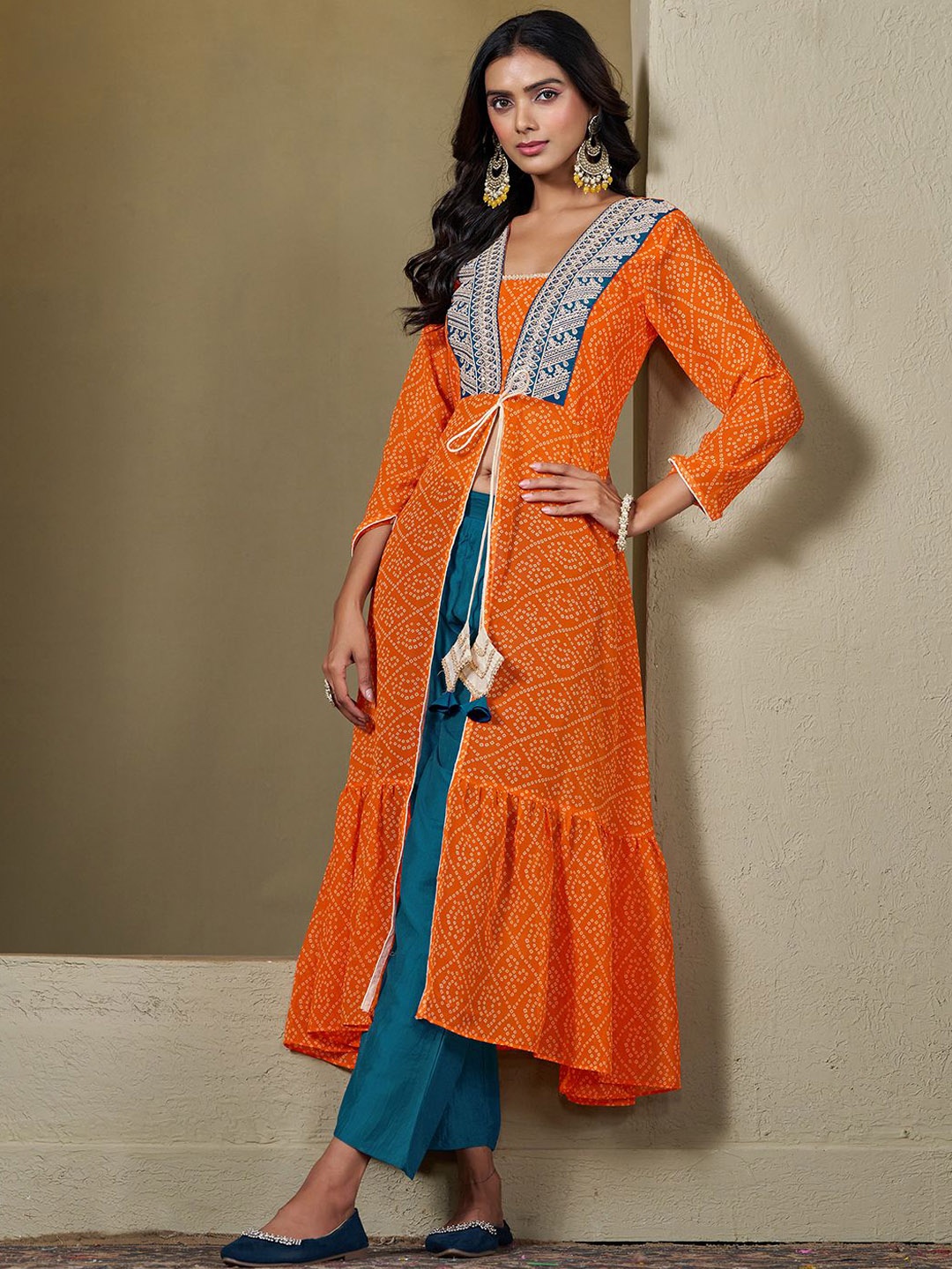 

Sangria Orange Bandhani Printed Georgette Straight Kurta With Palazzos