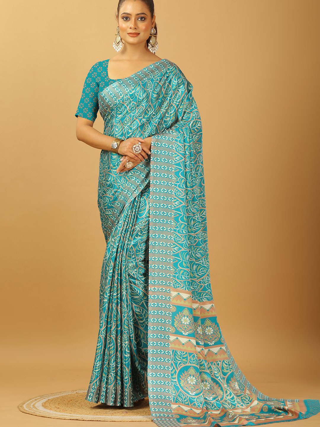 

A.V.M. SILK MILLS Floral Printed Pure Crepe Saree, Turquoise blue