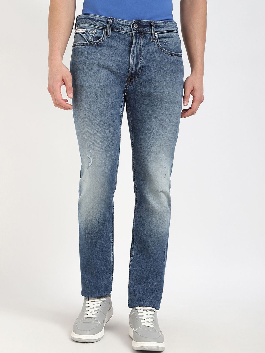 

Calvin Klein Men Cotton Slim Fit Low Distress Heavy Fade Jeans, Blue