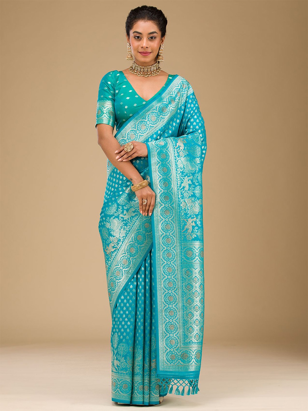 

Koskii Woven Design Turquoise Blue Stone work Art Silk Saree